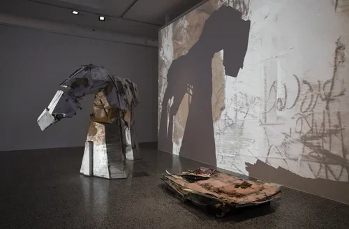 The Space Behind, 2022, Installation; stop motion animation, mixed media concrete sculpture, reclaimed truck tarpaulin Concrete sculpture; (concrete, steel, hessian, canvas, felt, steel rope, hemp rope)186 x 280 x 154cm Audio by Hugh Fasher Commissio