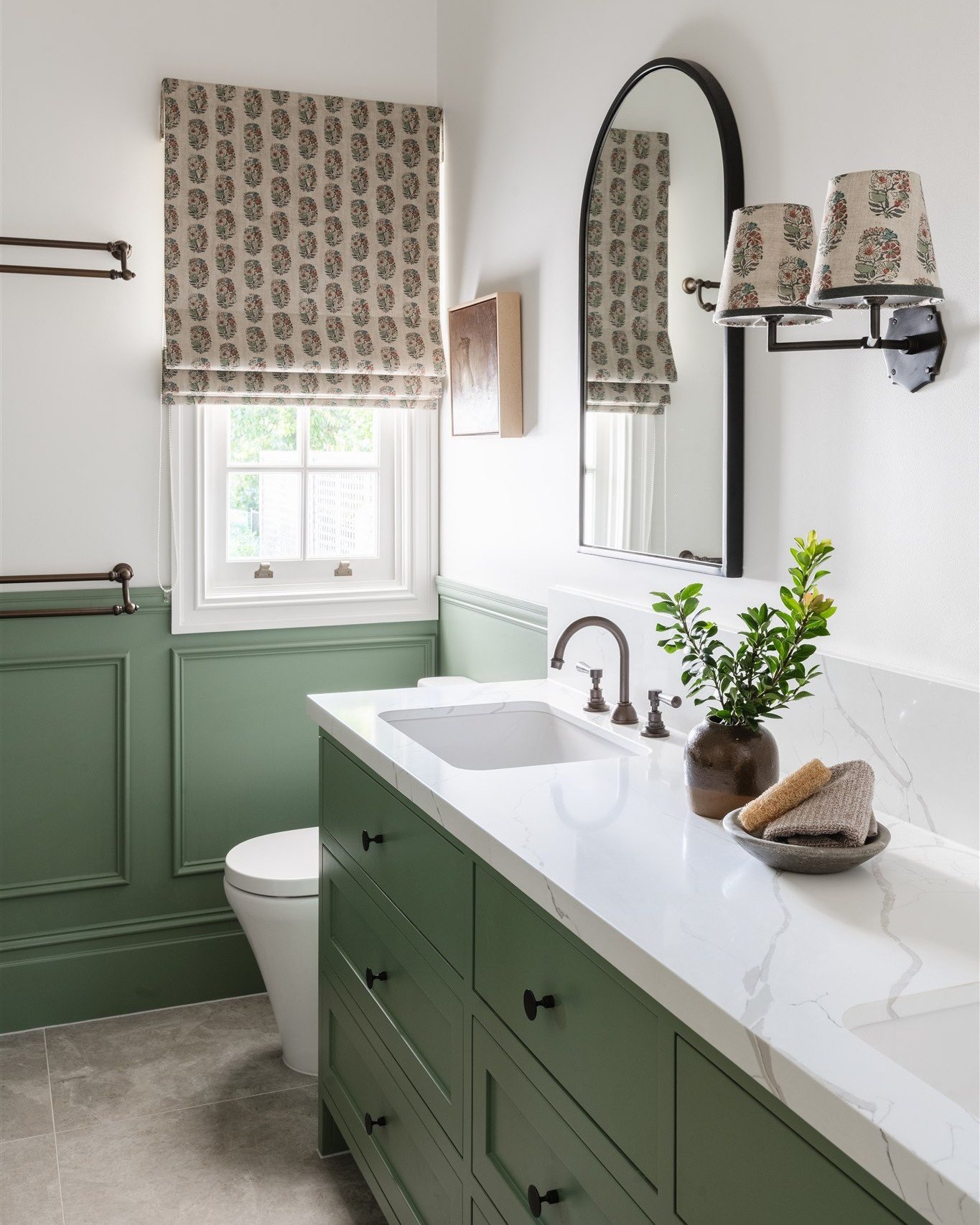 A rich, mid-green &ndash; reminiscent of classic English interiors &ndash; sets the tone for this thoughtfully designed children&rsquo;s bathroom in our East Toowoomba Project. 

Wainscoting-lined walls, a freestanding bath, aged bronze tapware, cust