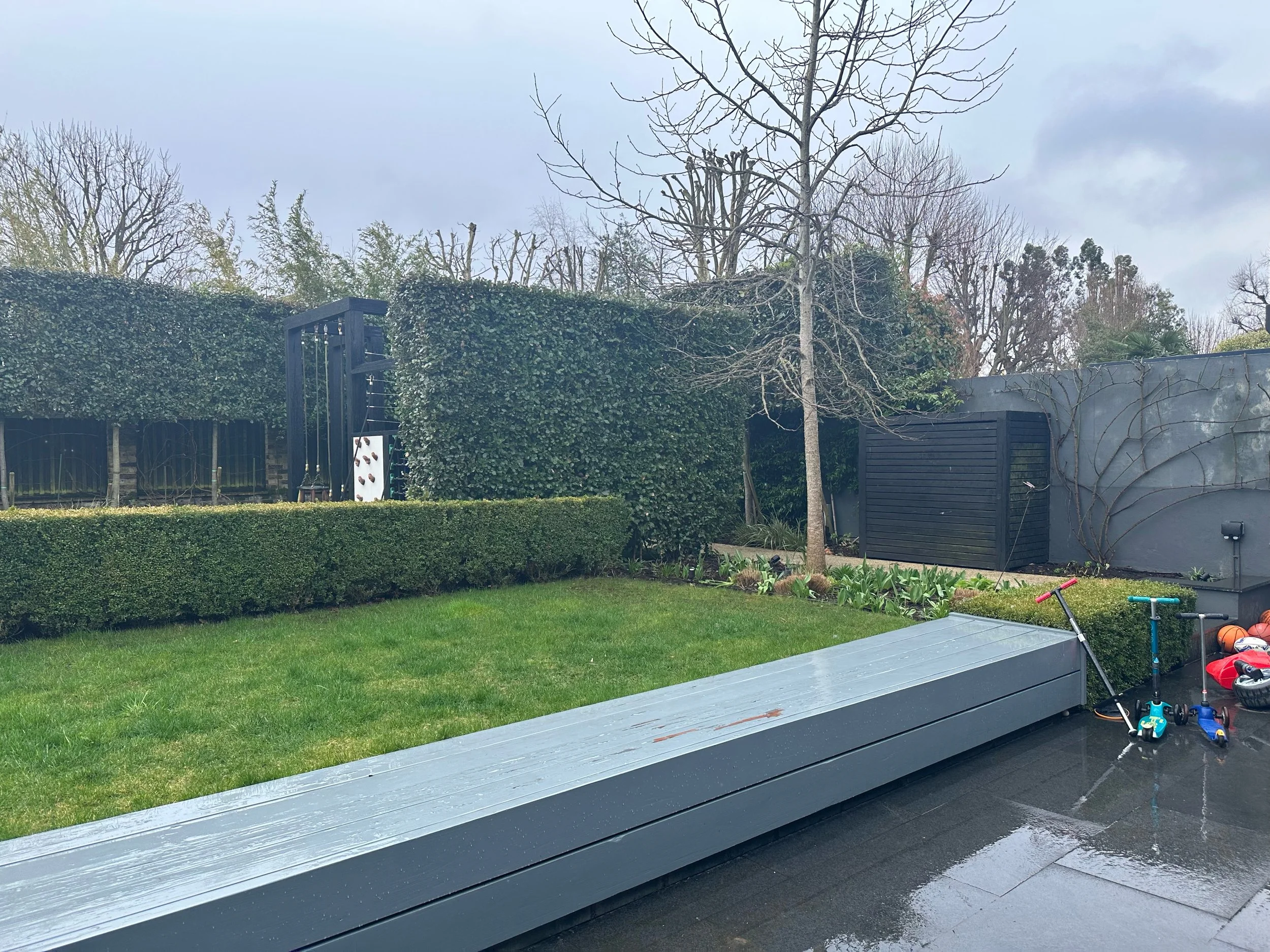 Putney garden before renovation showing the original lawn and terrace