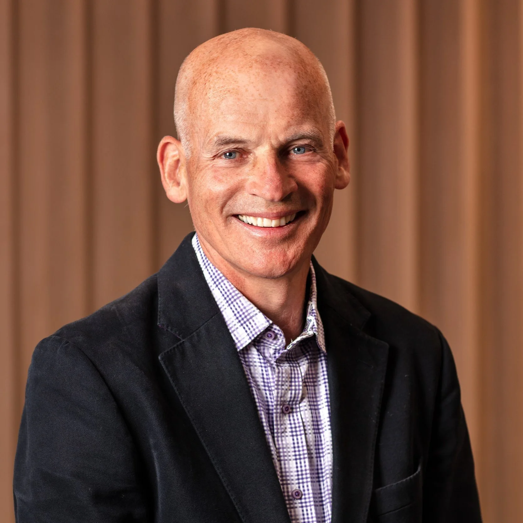 Building a True Community Through Remote Work with John Riordan