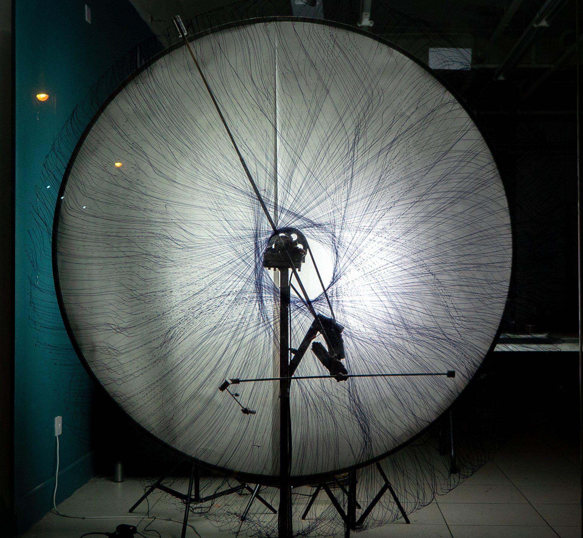 Kinetic drawing machine creating complex spherical patterns with sensor activated motorised arms. Installation filmed at @wypw by @sallymolineaux.