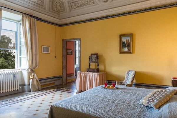 The Yellow Room — spacious double bedroom with garden views