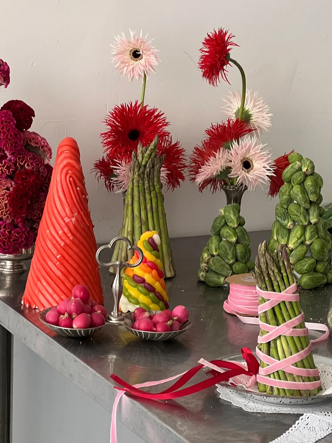 BTS from @monsoon Christmas campaign. Shot in July, with  the loveliest team!! &lt;3 

We sourced all the antique silverware &amp; doilies. Food styling from jellie bean towers to bondage asparagus. Absolutely adored the ribbon baguettes&hellip;Spide