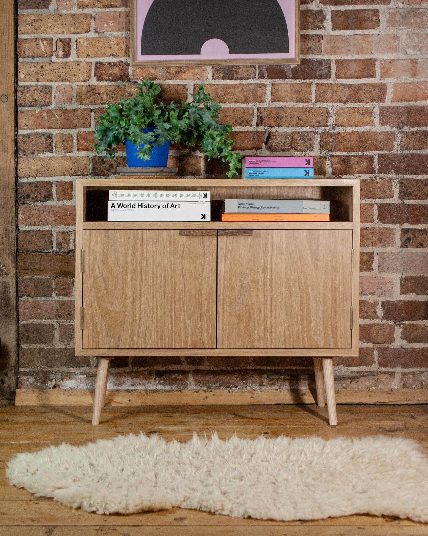 New mid-century-ish custom media unit for a client in dorchester, in solid oak with walnut details and ash legs.