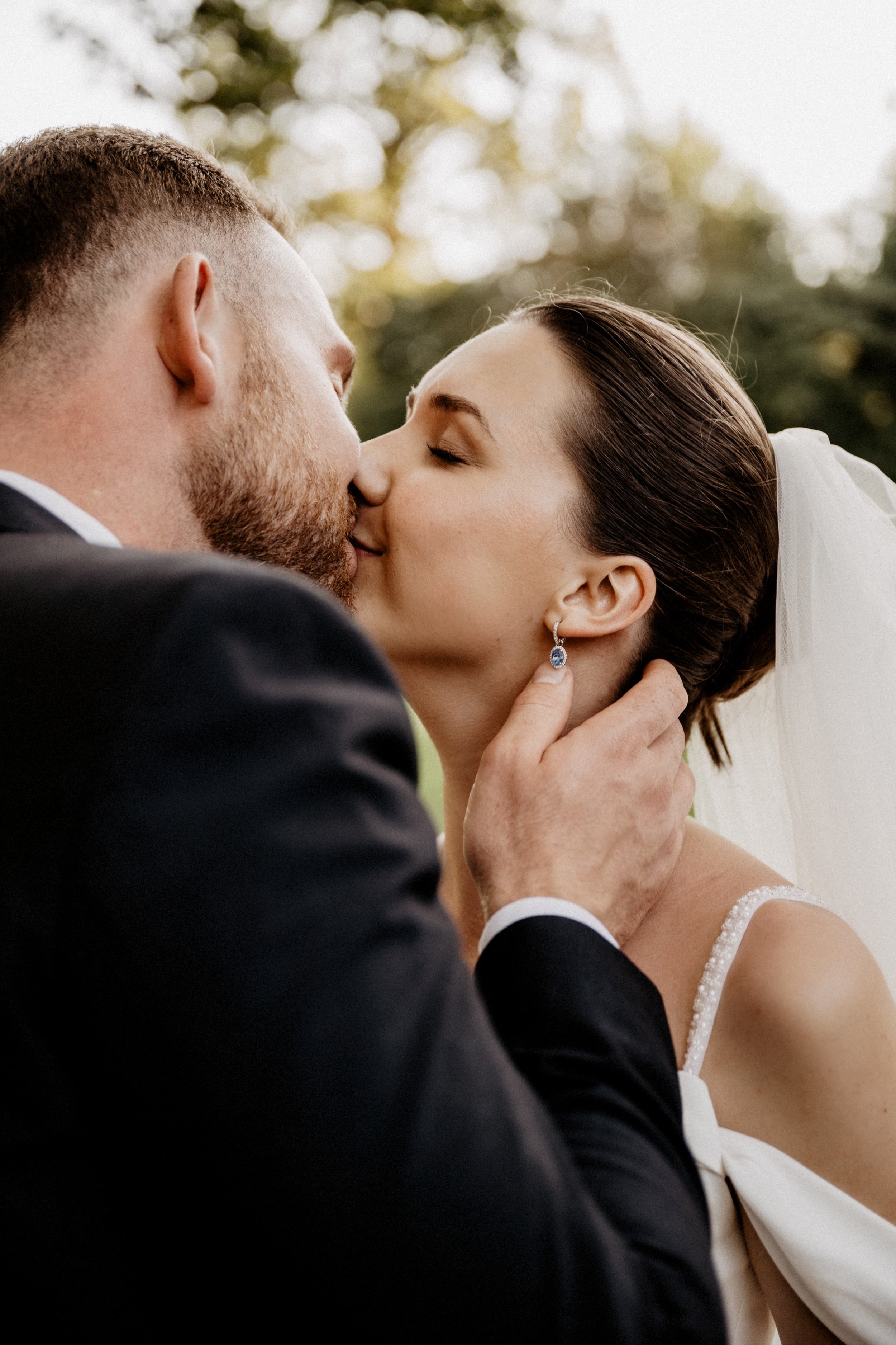 bride and groom in boat at lake henry