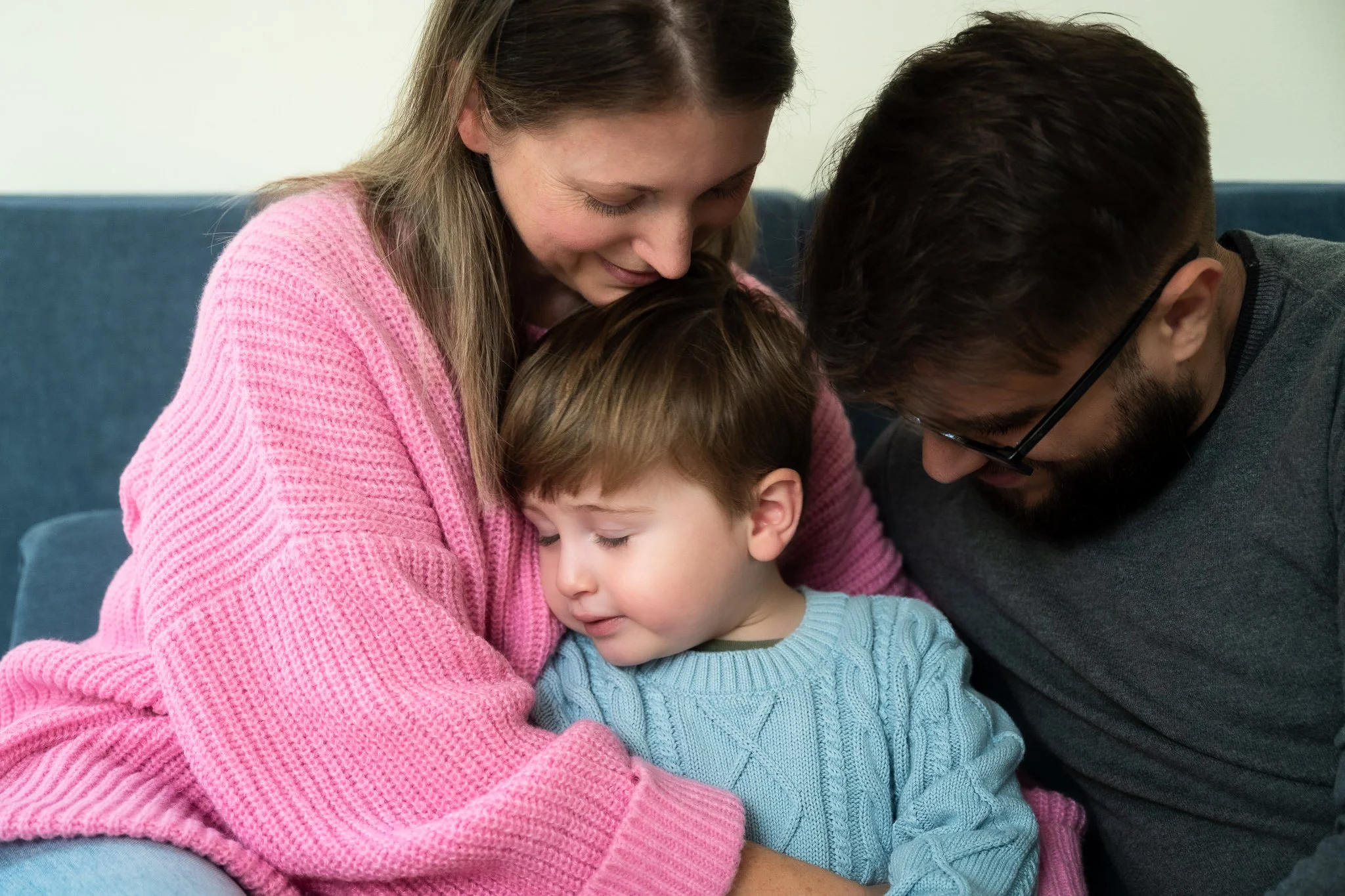 in home family photo session in Charlotte, NC using a strobe light to mimic natural light