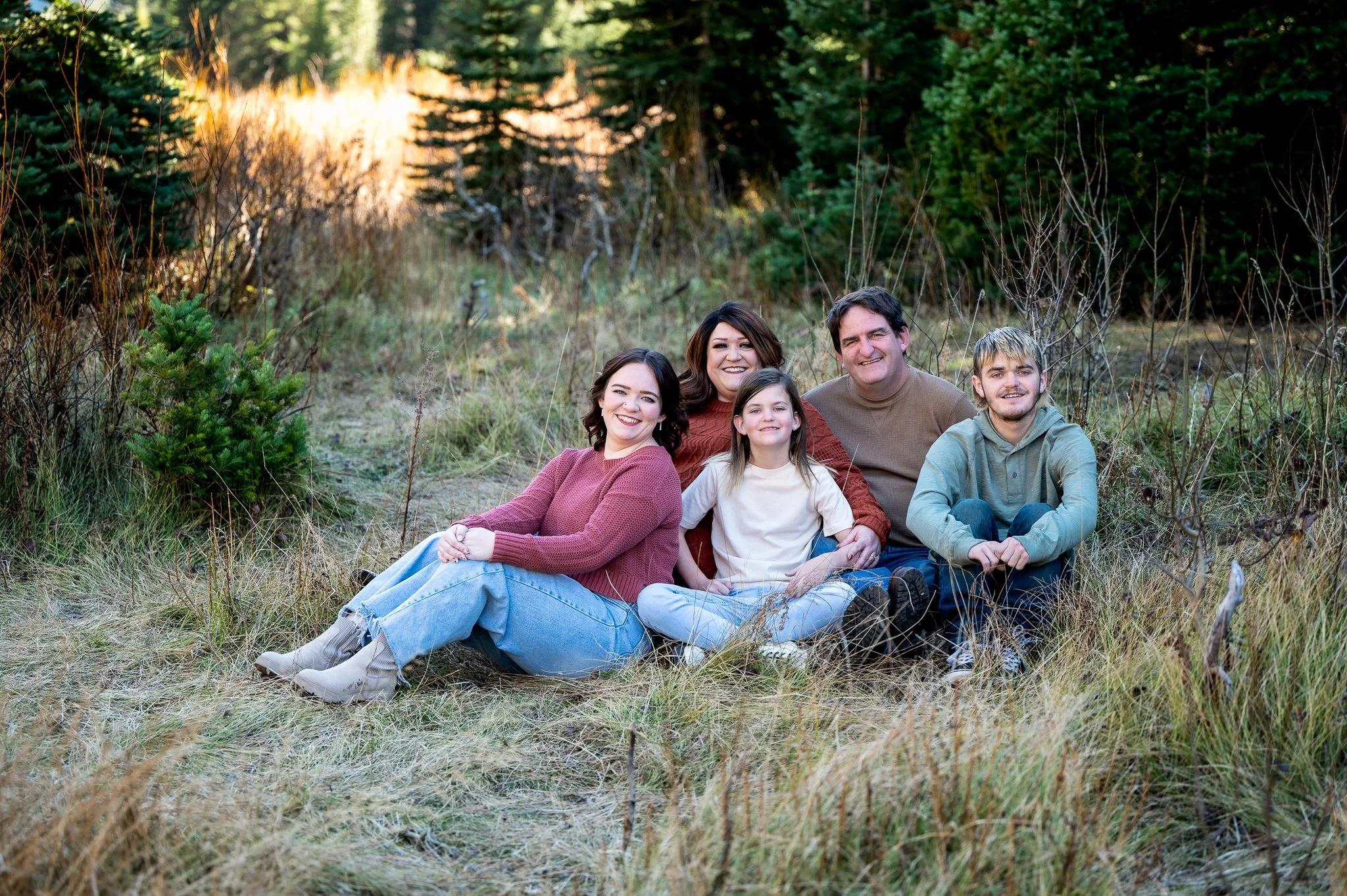 family in well coordinated outfits for fall family photos
