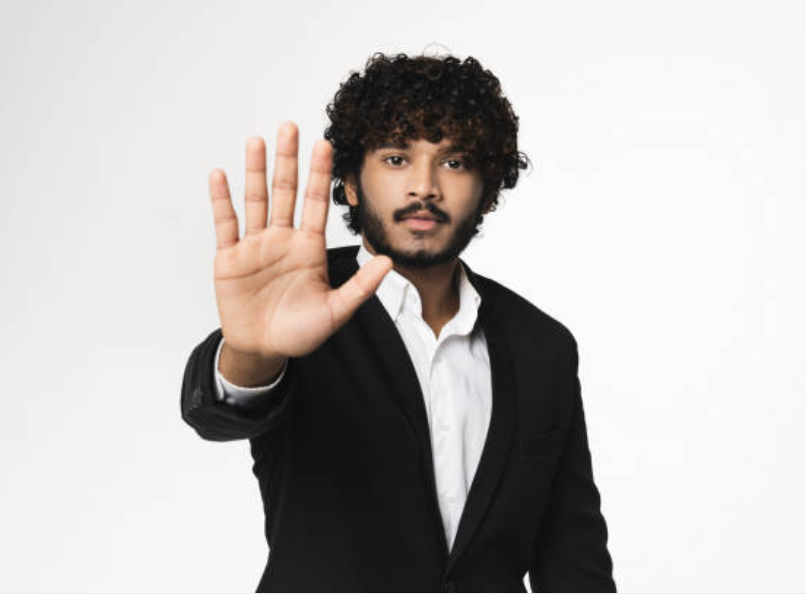 North African man with hand up