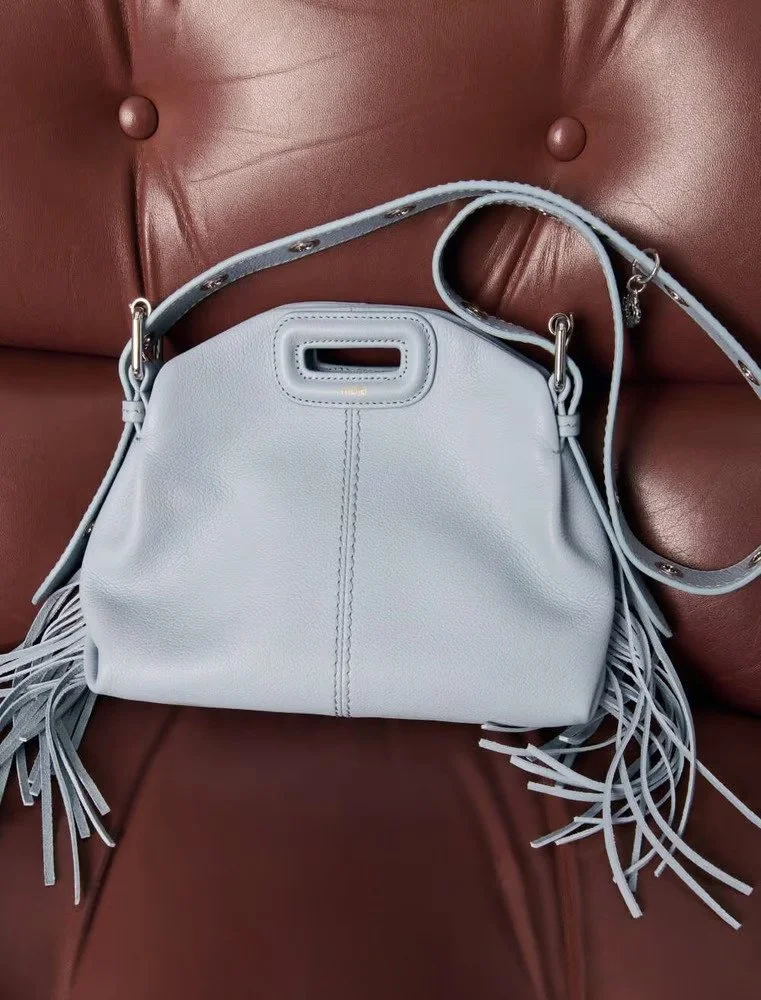 Maje creates handbags using deadstock leather collected by Adapta