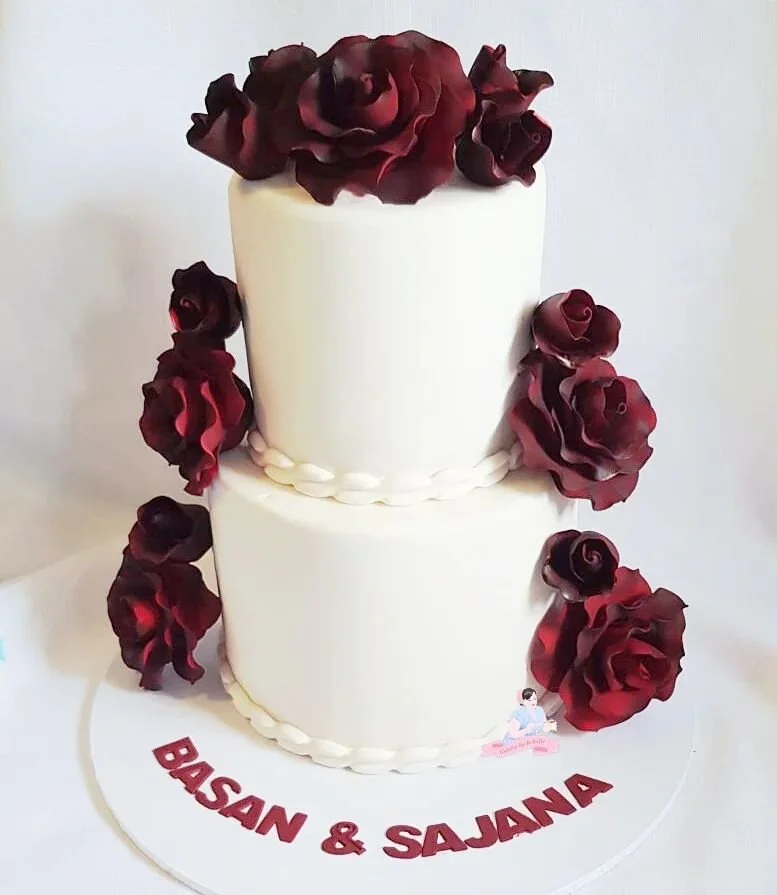 Deep red airbrushed roses for this happy couple

#cakerybykbelle #weddingcake #weddingcakessydney #wedding #weddingcakewithflowers #weddingcakes #fondantroses #weddingcakesofinstagram #sydneyweddingcakes #sydneycakes #cakeartist #cakeart