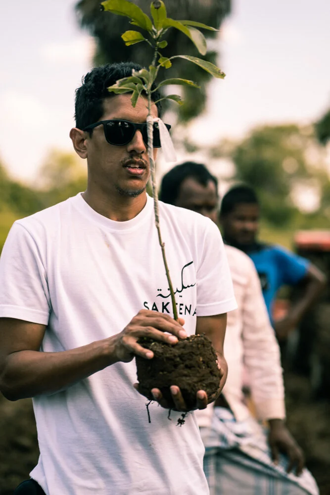 Eshan Iqram Deane Planting Trees.JPG