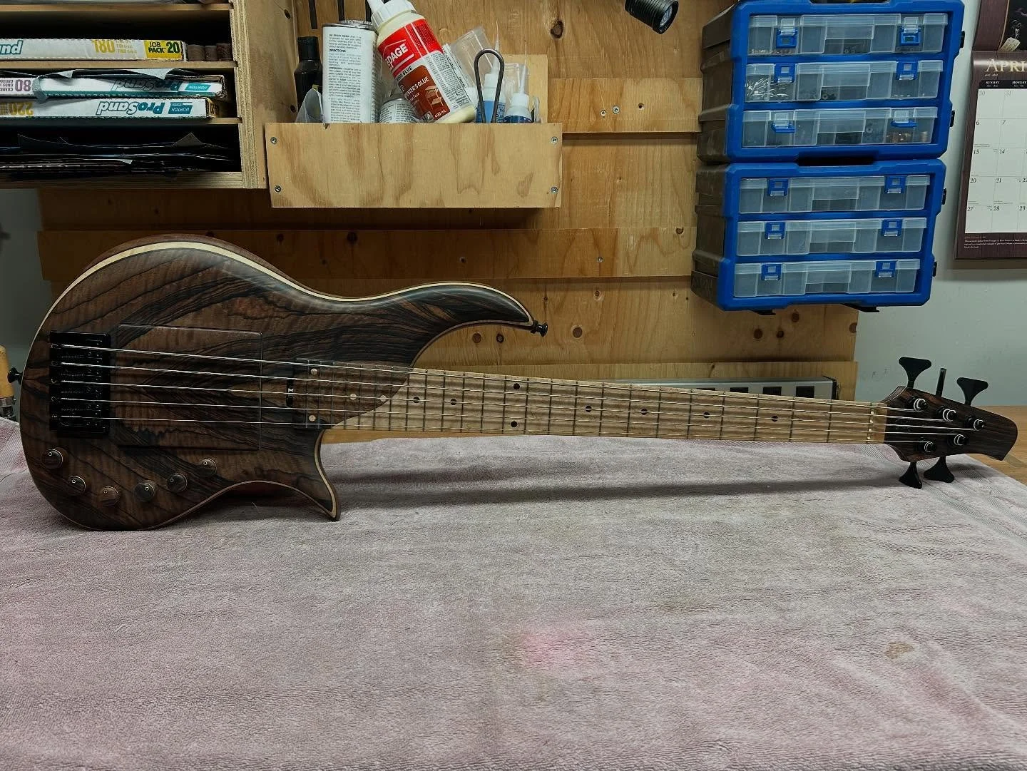 A Custom-series Condor 5 string bass with a stunning, once-in-a-lifetime set of Mun Ebony.

*Available for purchase*

30.75&rdquo; scale length, E-C tuning
16.5 mm bridge spacing, 45 mm nut
Neck-through-body construction
Flamed Mun Ebony top
Flamed C