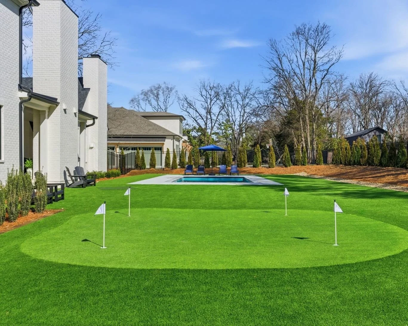 A putting green, resort-style pool, and theatre room, all set on an acre in Oak Hill, this is truly a spectacular Listing We Love.

This custom-built home features 5 en suite bedrooms, including a primary suite with dual bathrooms and walk-in closets