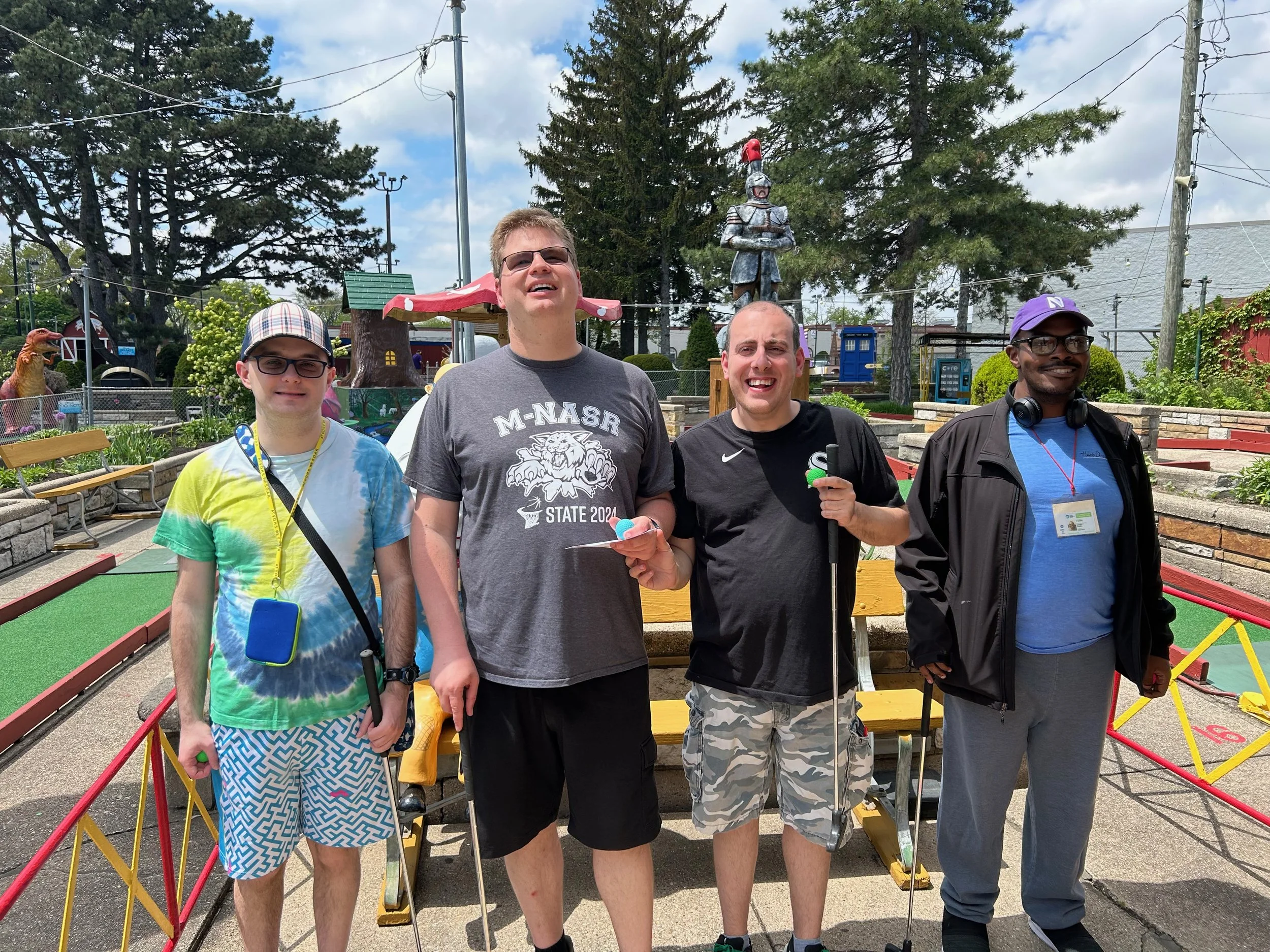Mark, Zach, Andrew, Xavier mini golf.jpeg