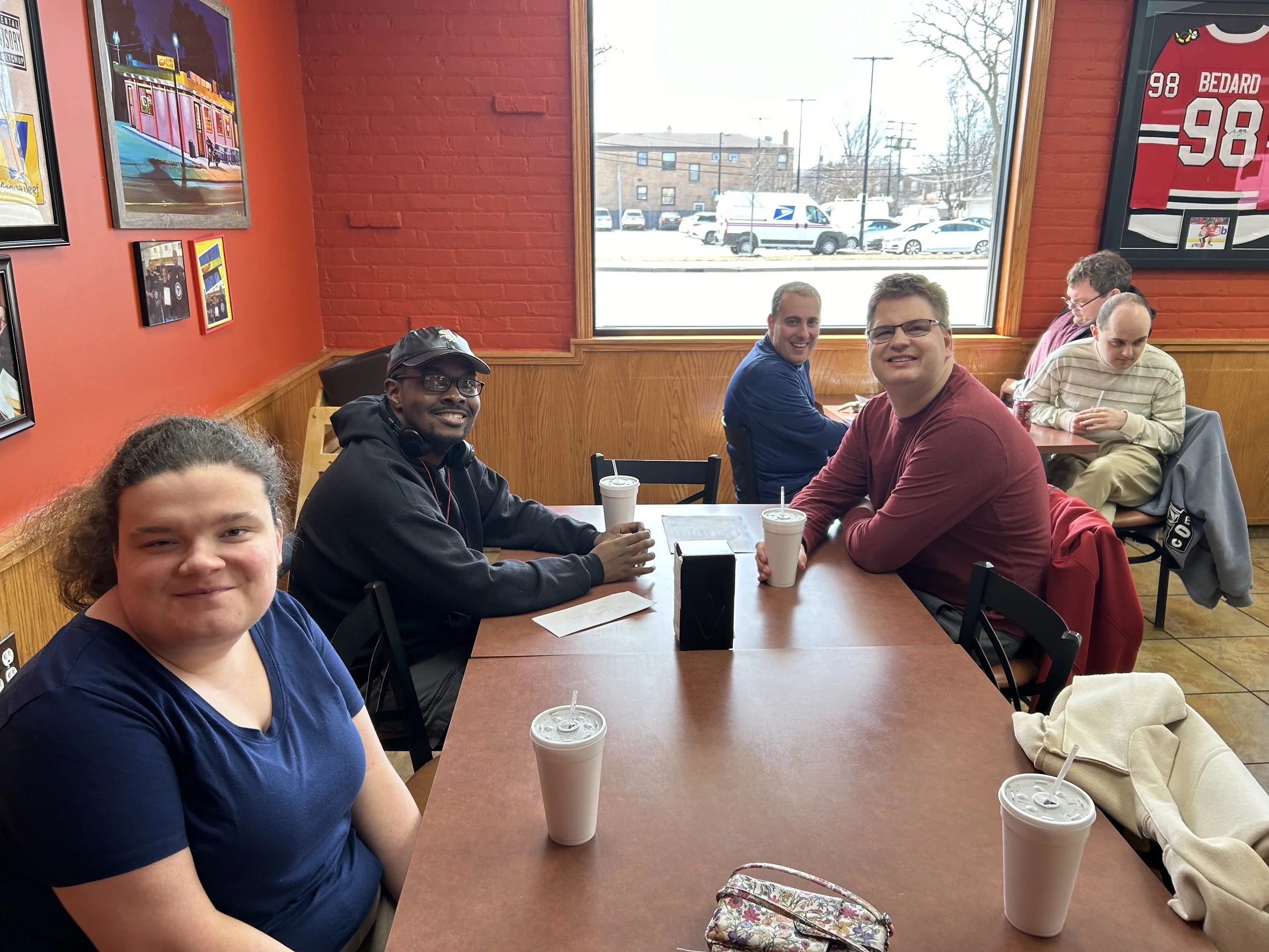 Allie,Xavier,Andrea,Zach smiling at lumch.jpg