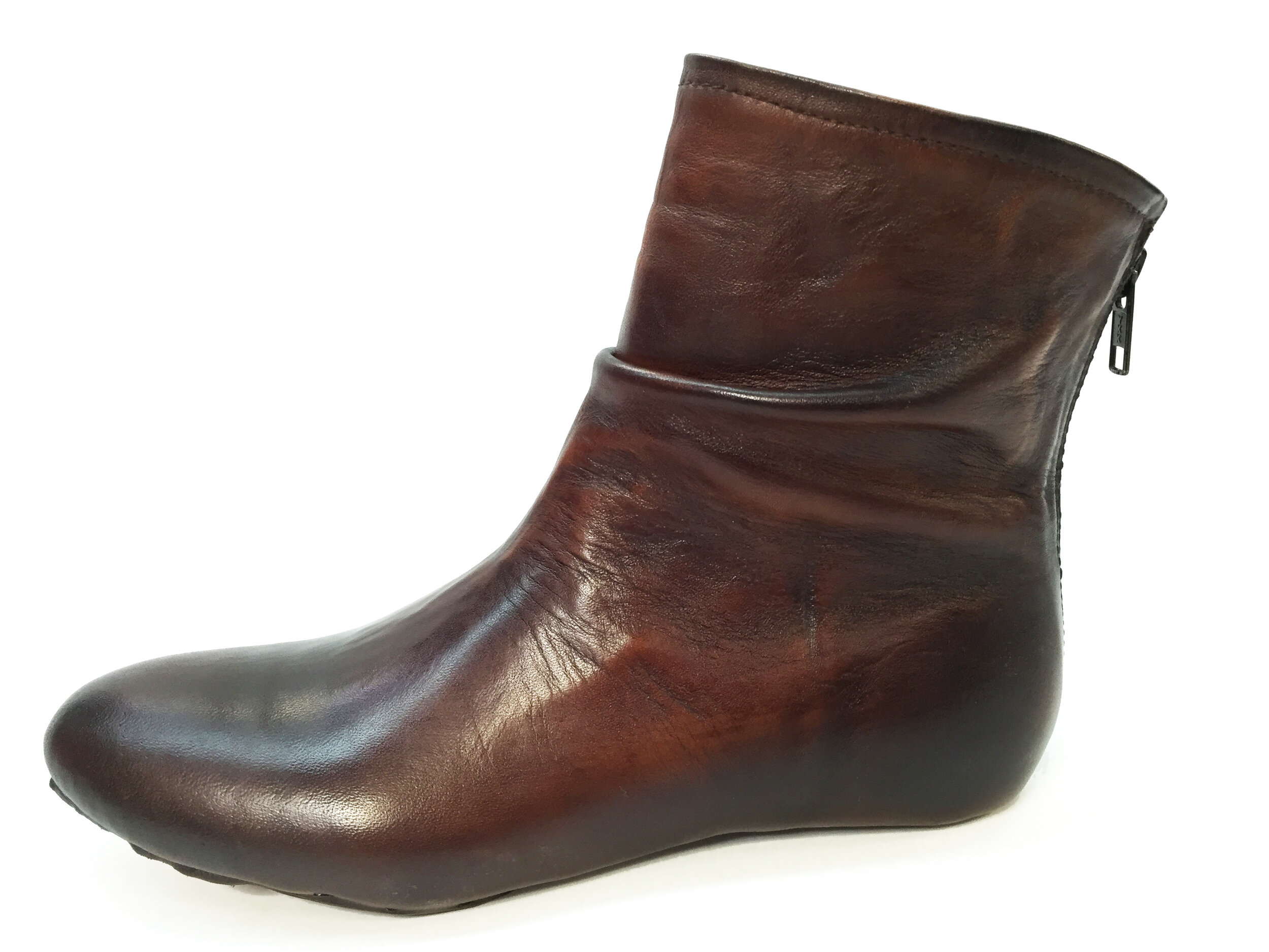 tremendous finishing work with Italian shoe finishing dyes and creams