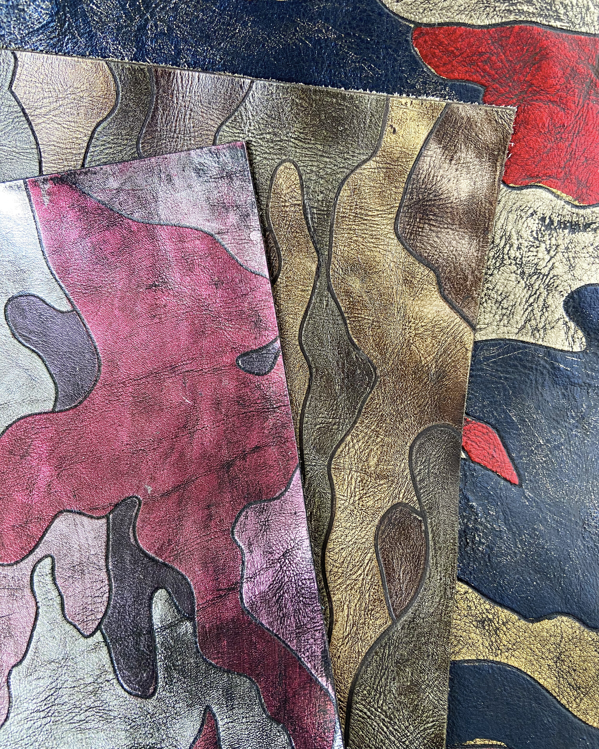 laser engraved camo pattern inspired by the traditional Woodland pattern from the US army, metallic foils applied by hand, with further finishing