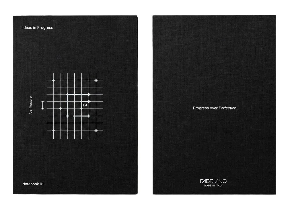 Two black notebooks with white text and graphics. The left notebook says 'Ideas in Progress' and 'Notebook 01.' with a grid diagram labeled 'arch' and 'Kurt.' The right notebook says 'Progress over Perfection' and has a logo at the bottom reading 'FABRINO MADE IN ITALY.'