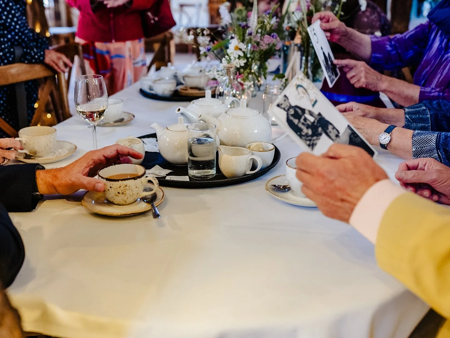 I&rsquo;m not sure when it became the done thing to spread old photos out at weddings, or have them hanging as decoration, but this family, reunited from all parts of Britain and Ireland, reminiscing over old photos at a recent wedding was a great th