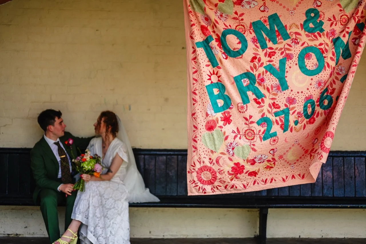 Weddings can be informal. Friends saying a few words. Outfits from Vinted. Shoes you&rsquo;ll wear again and again. On the lawn at your local pub. Your favourite people together in one place. 

That&rsquo;s how Tom and Bryony spent their wedding day 