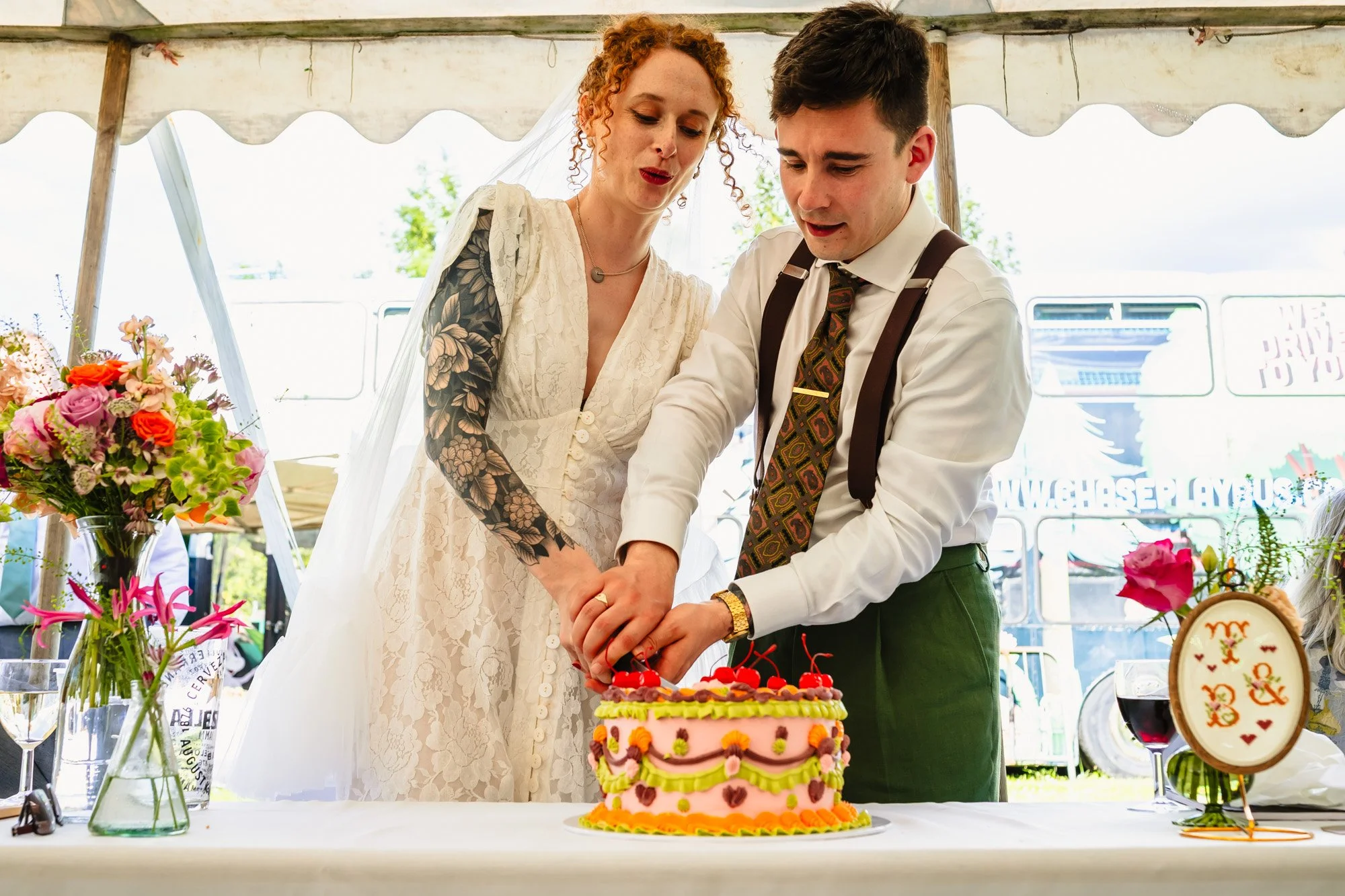  A bride and groom cut their cake  