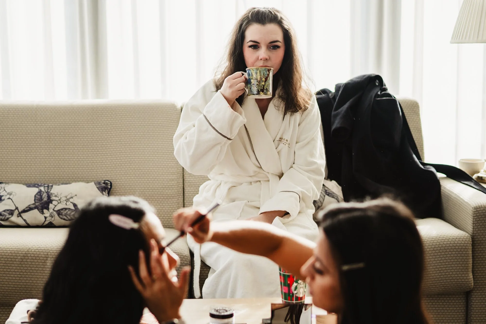 Candid unposed moment captured in documentary wedding photography, rather than a traditional directed pose