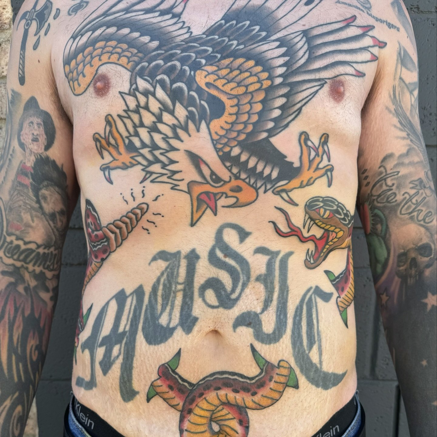 Finished the snake🐍 for Travis&rsquo; torso, he&rsquo;s a warrior for sitting tough.
Next we&rsquo;re working on some background elements!
Thanks for looking, books always open. Dm or email for app and availability.
.
.
.
.
#traditionaltattoo #snake