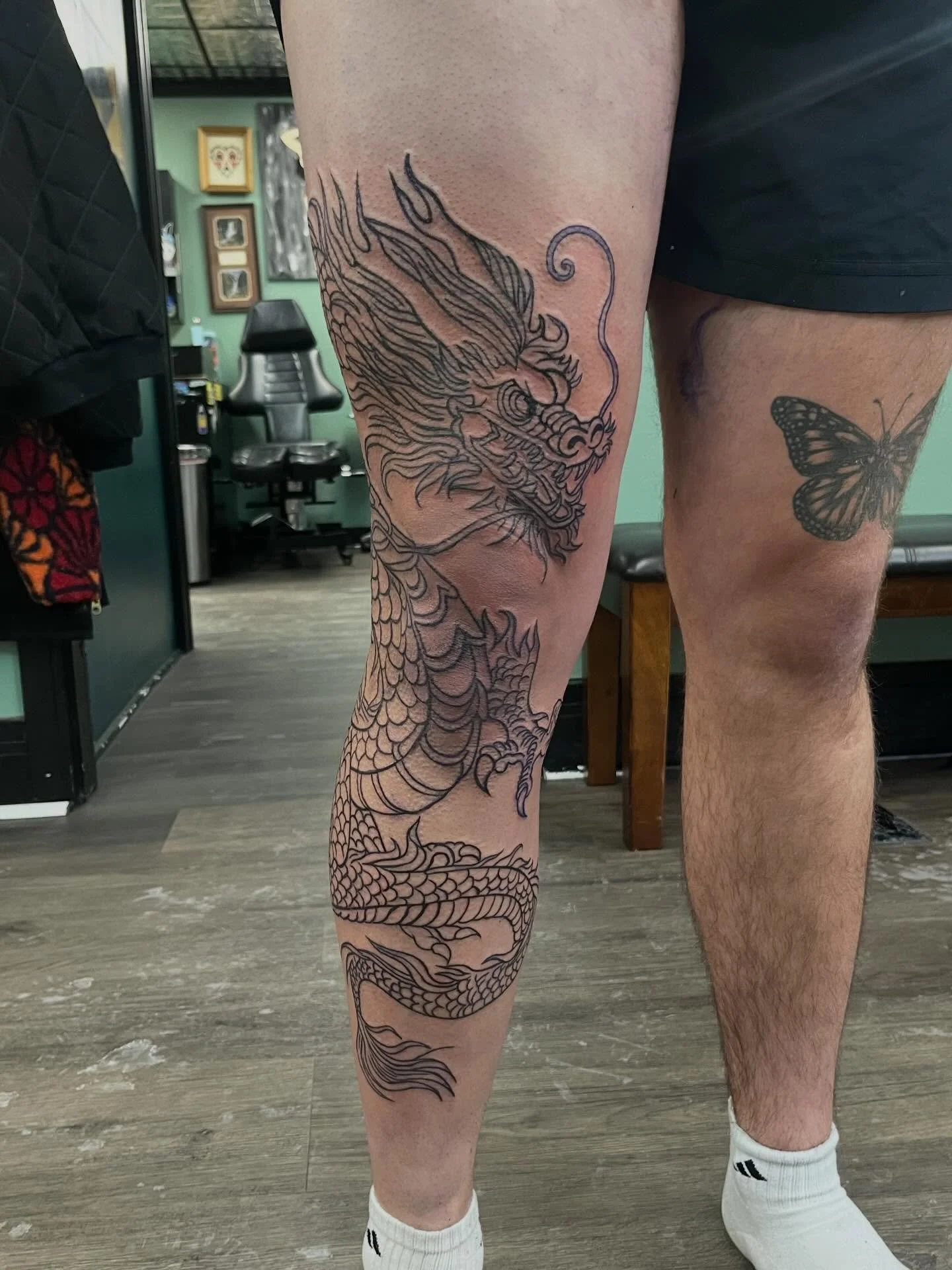 Huge shoutout to this guy! Tough as nails! We blasted these lines on in 5 hours! Thanks for the trust @nkburgner I can&rsquo;t wait to shade him!!! #dragon #tattoo #milwaukeetattoos @riverwesttattooco