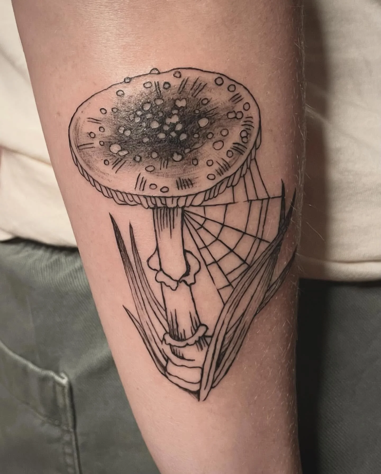 mushroom variation from my flash for hillary 💖🍄&zwj;🟫🕸️ 
loved doing this one and always happy to alter flash to fit your bod 💖
.
.
.
.
#mushroomtattoo #milwaukeetattooartist #wisconsintattooartist #finelinetattoos