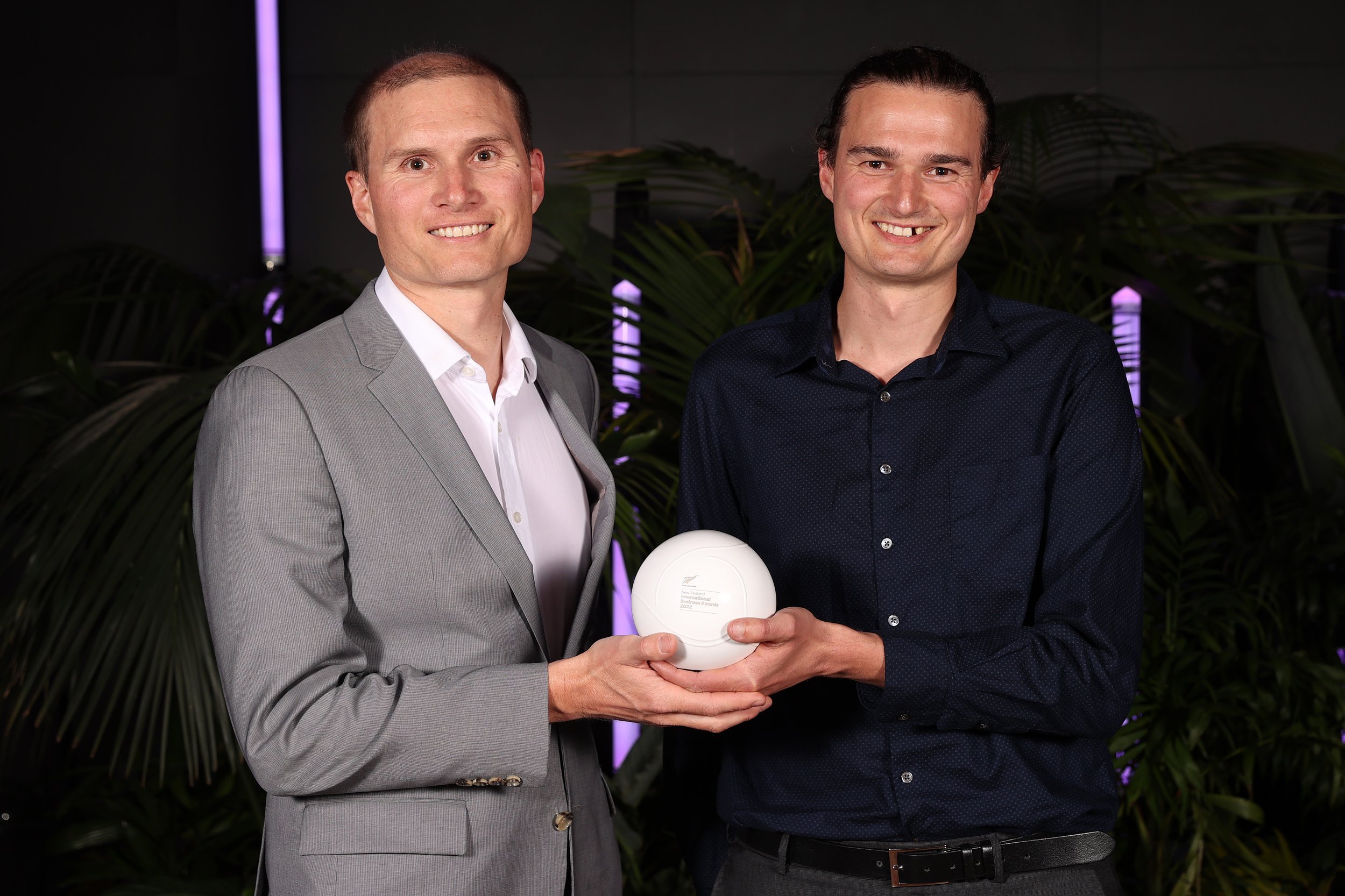  AUCKLAND, NEW ZEALAND - OCTOBER 27: Winners of the Best Medium Business award James Powell (L) and Stefan Powell (R) of Dawn Aerospace pose for a photograph during the New Zealand International Business Awards 2022 at Shed 10 on October 27, 2022 in 