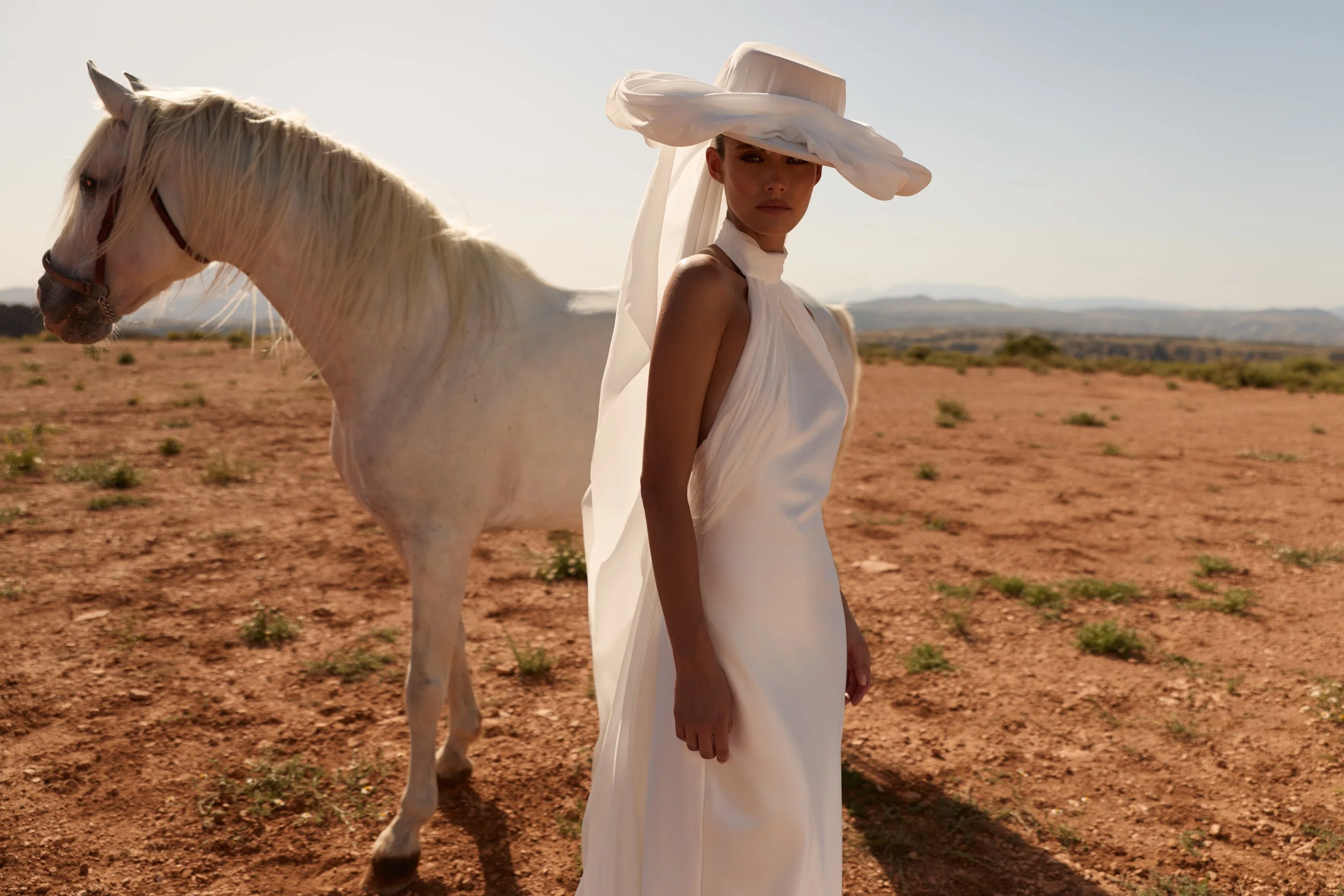 satin wedding dress, halter neck wedding dress, minimalist wedding dress, high neck wedding dress, wedding dress with chiffon train, modern satin wedding gown NYC
