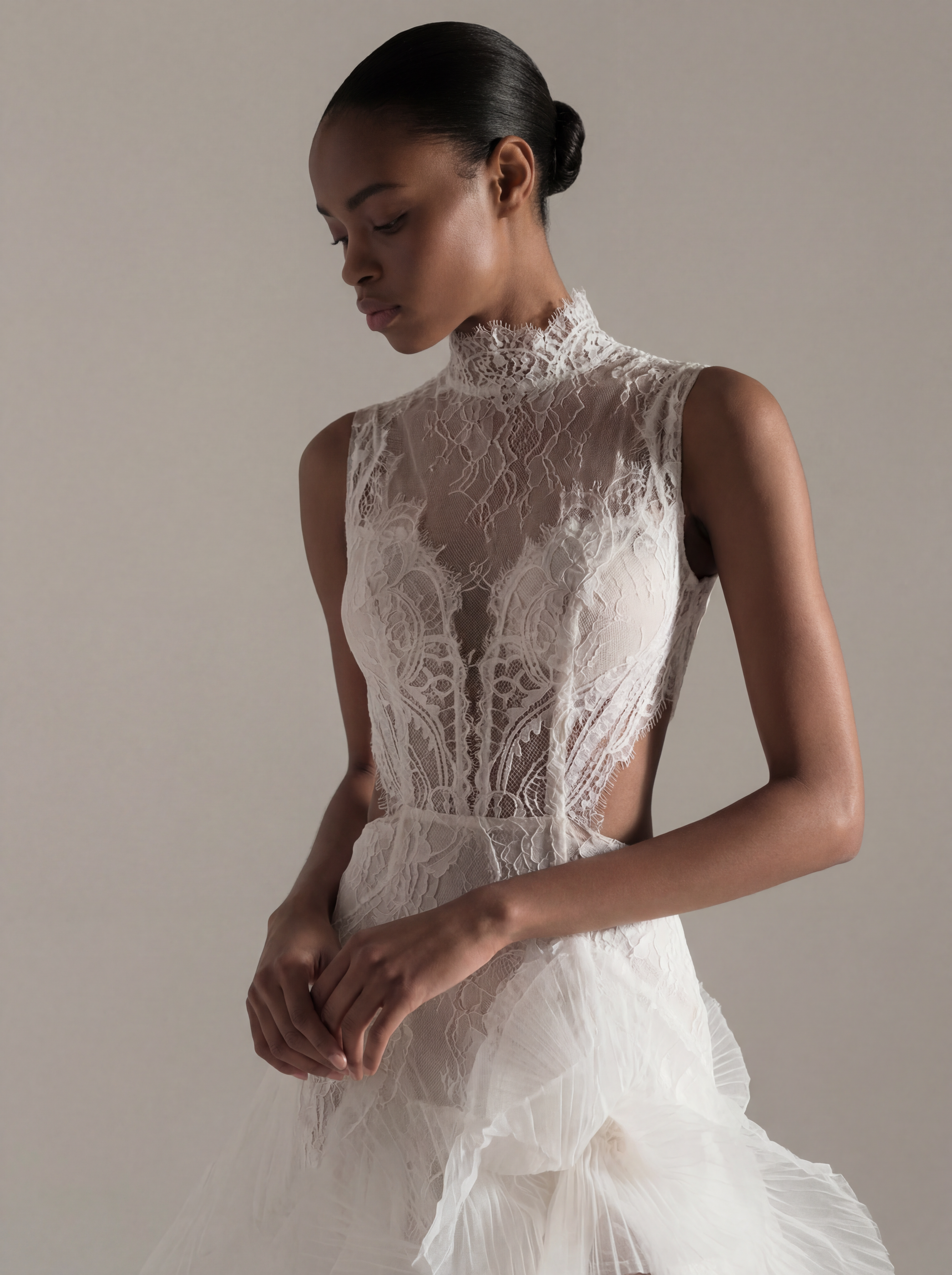 Feminine lace high-neck wedding dress with bold ruffled organza skirt – Edith