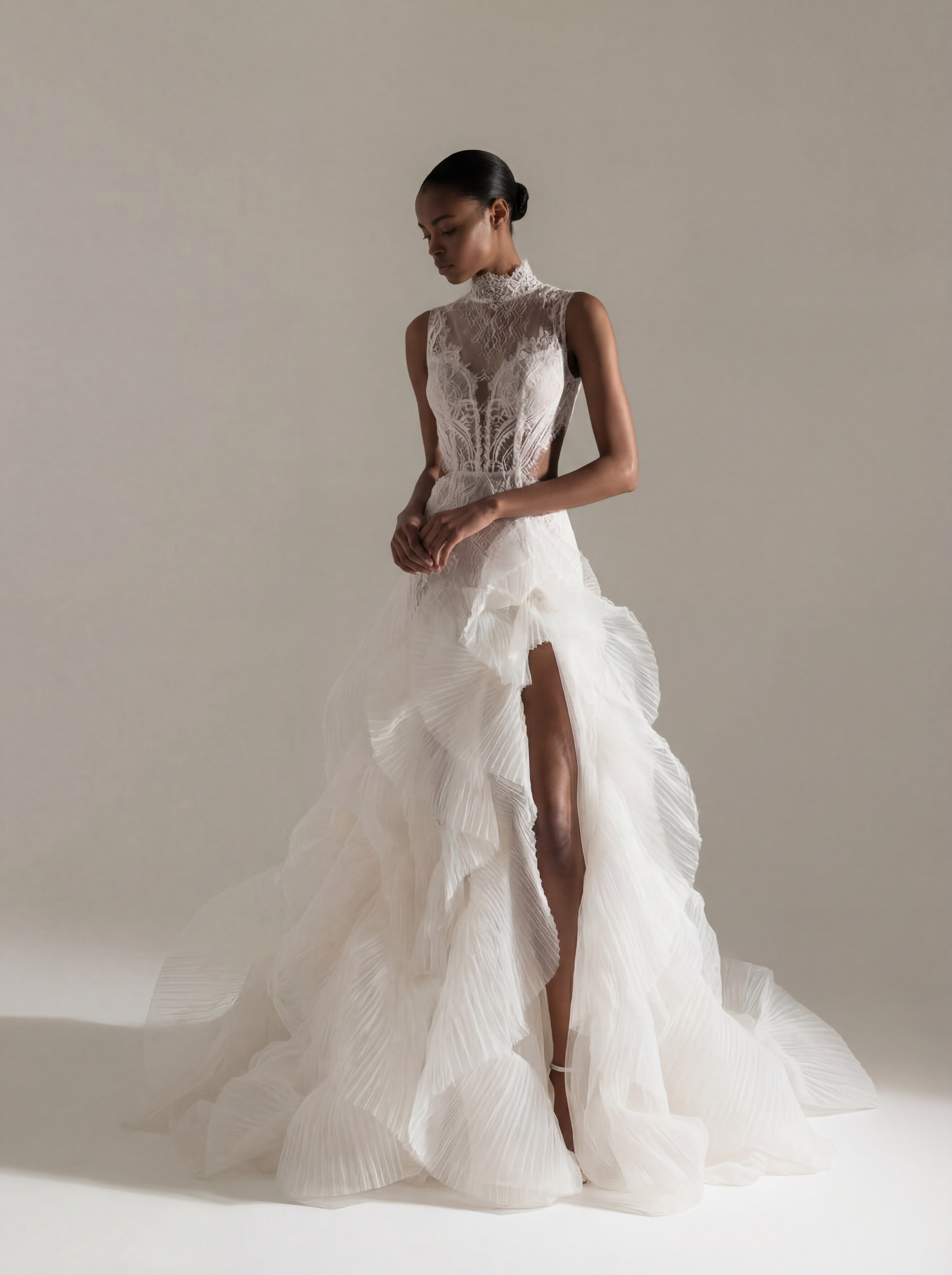 Feminine lace high-neck wedding dress with bold ruffled organza skirt – Edith