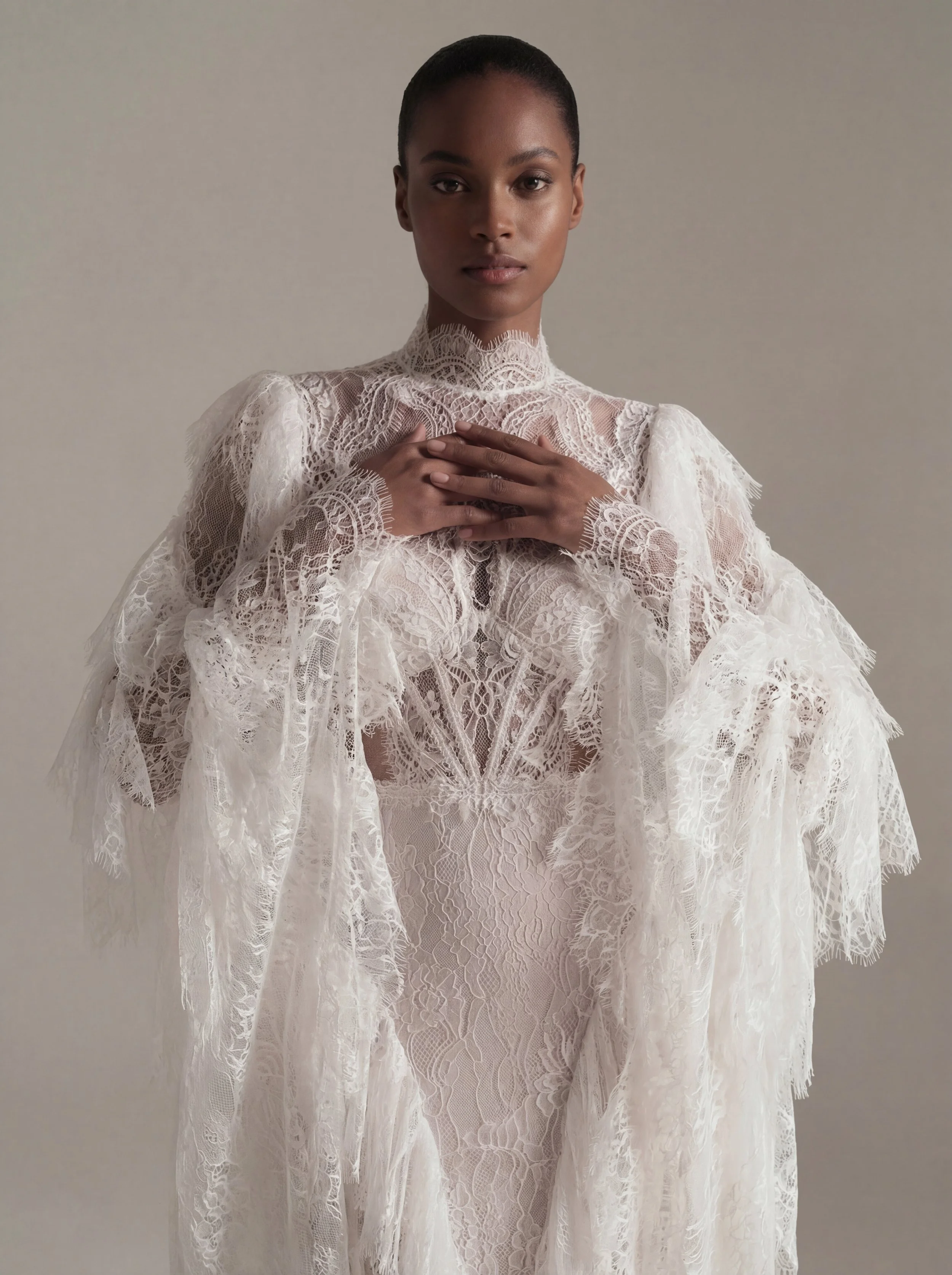 Vintage-inspired gothic lace wedding gown with dramatic sleeves – Odette by Lana Marinenko