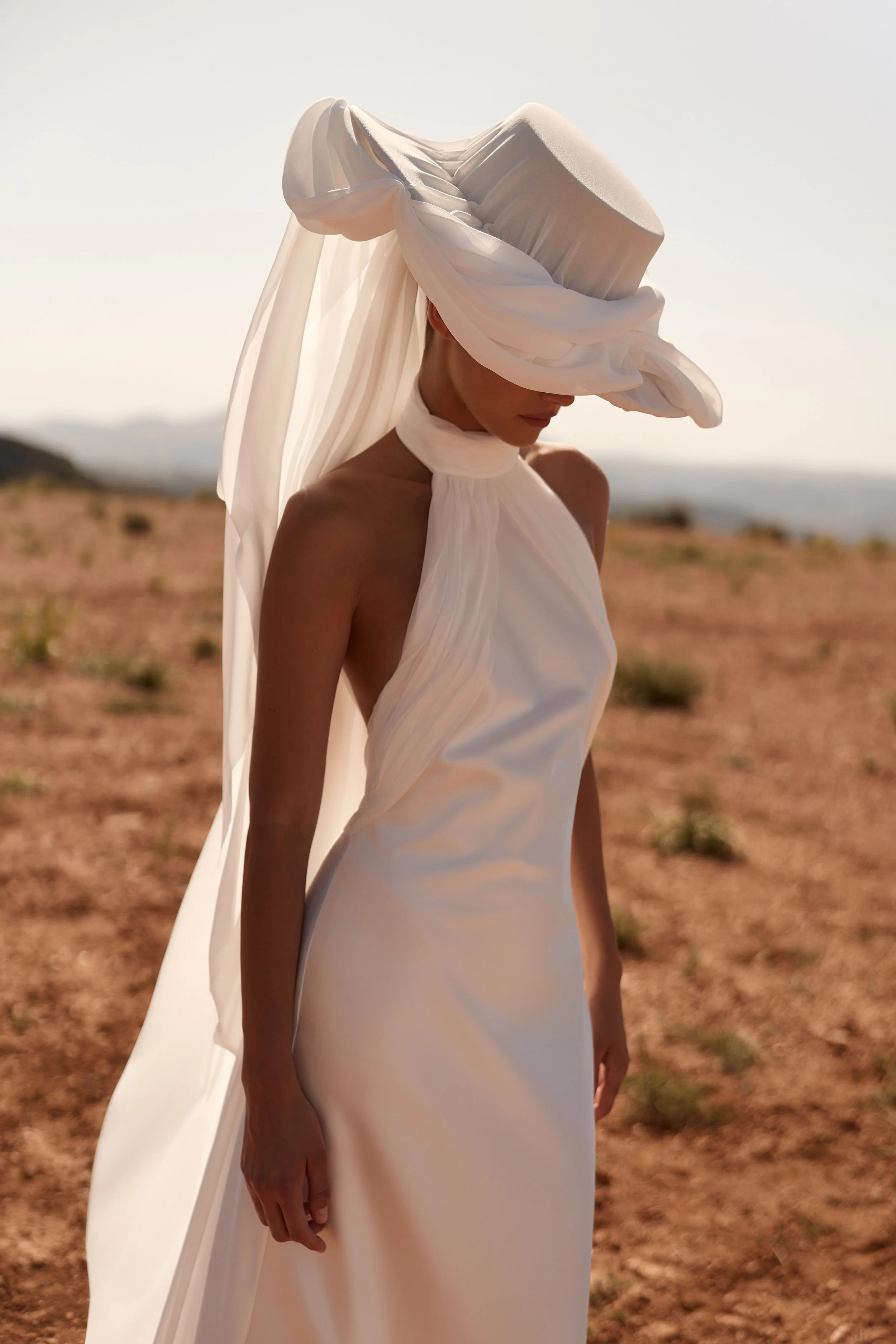 satin wedding dress, halter neck wedding dress, minimalist wedding dress, high neck wedding dress, wedding dress with chiffon train, modern satin wedding gown NYC