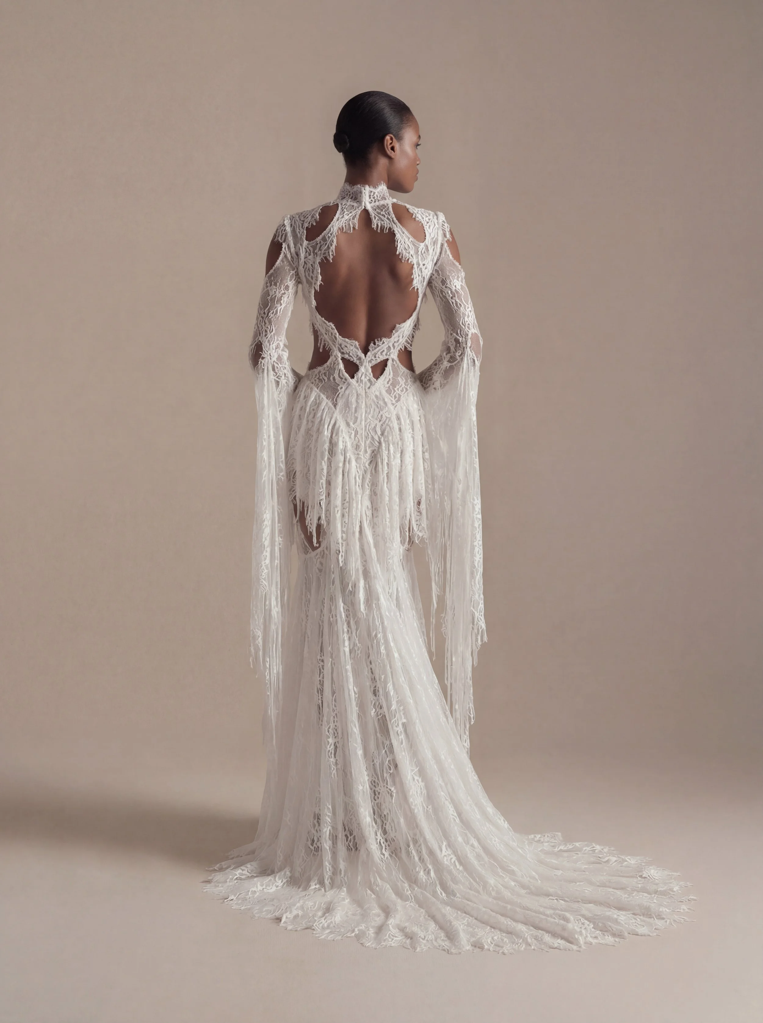 Feminine mermaid wedding gown with lace details, bell sleeves, and open back – Ellie