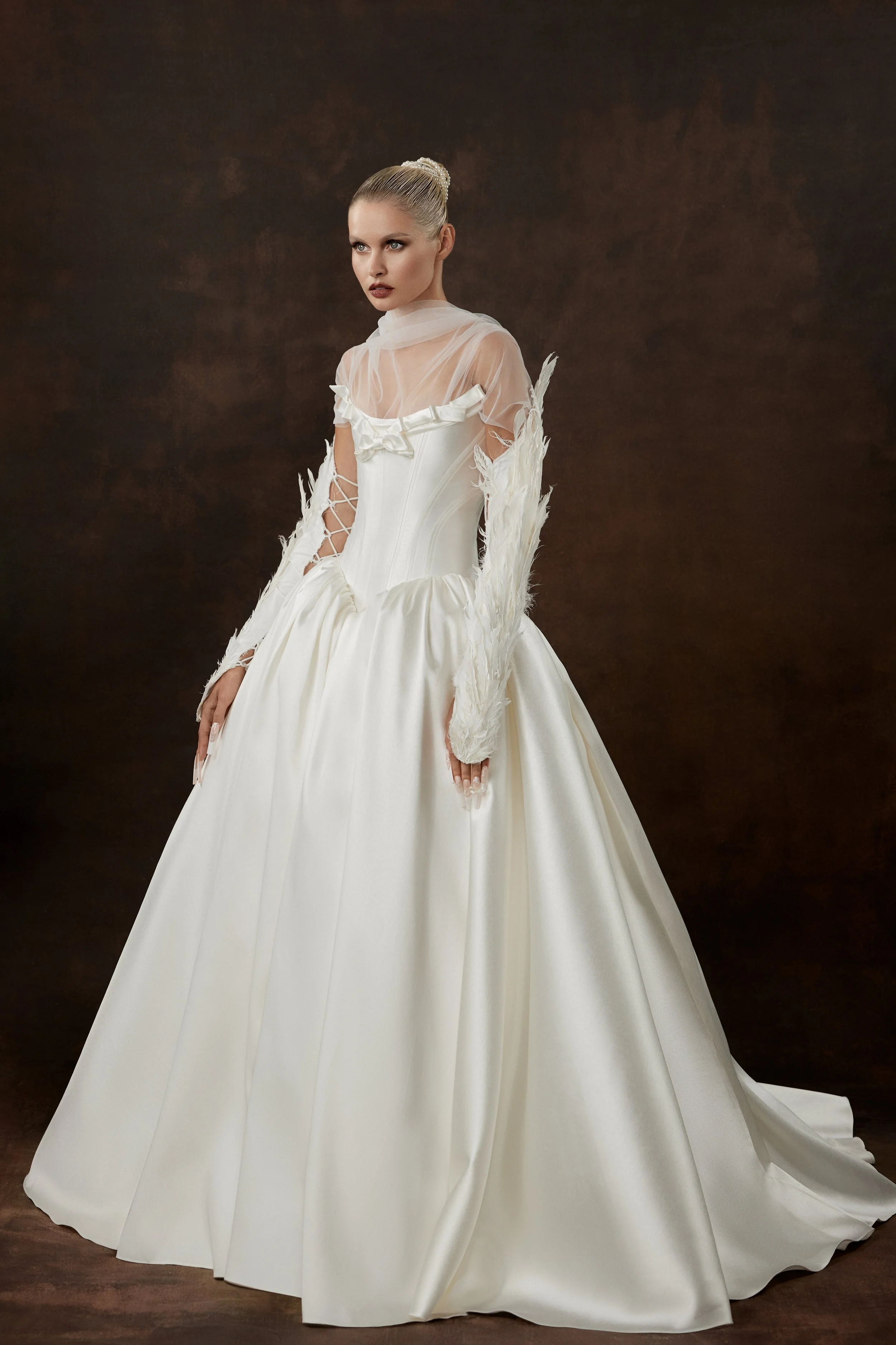 Ioanna wedding dress by Rara Avis — full front view of heavy satin ball gown with scoop neckline, ribbon trim detail, and dramatic long train