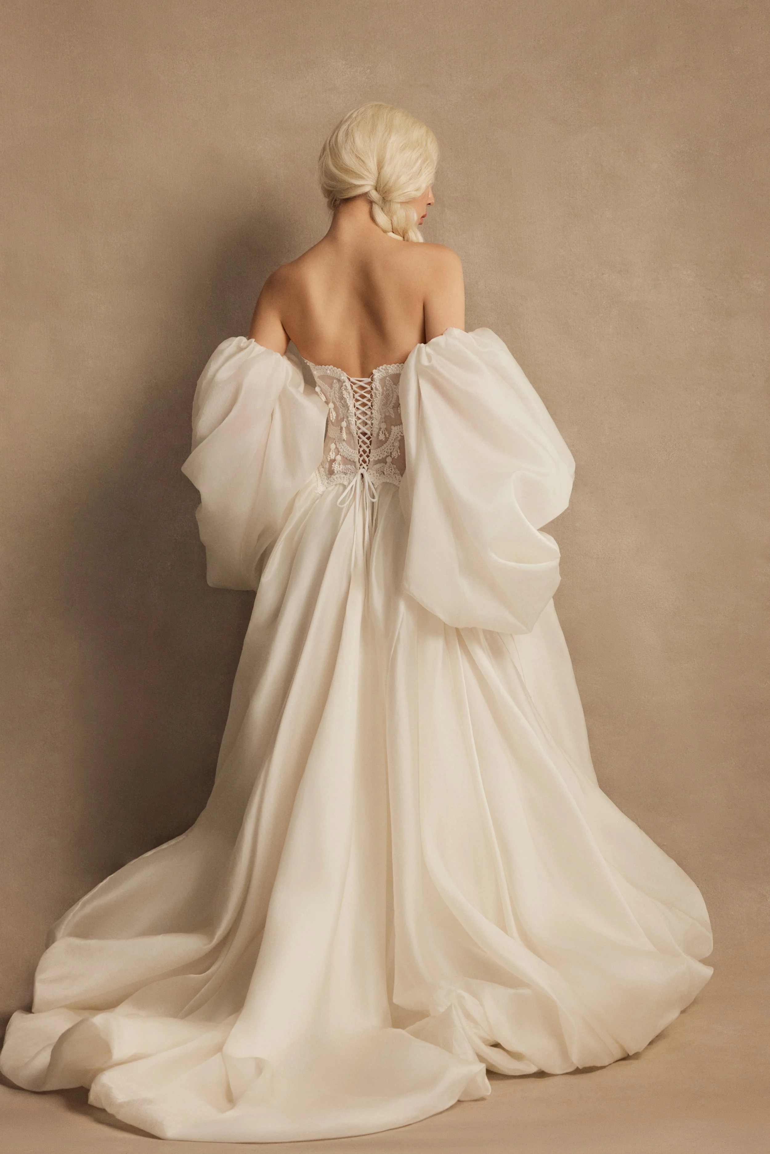 Bliss wedding dress by Rara Avis — full front view of princess lace corset bridal gown with pearl embroidery, beaded tassels, and puffed cream silk skirt