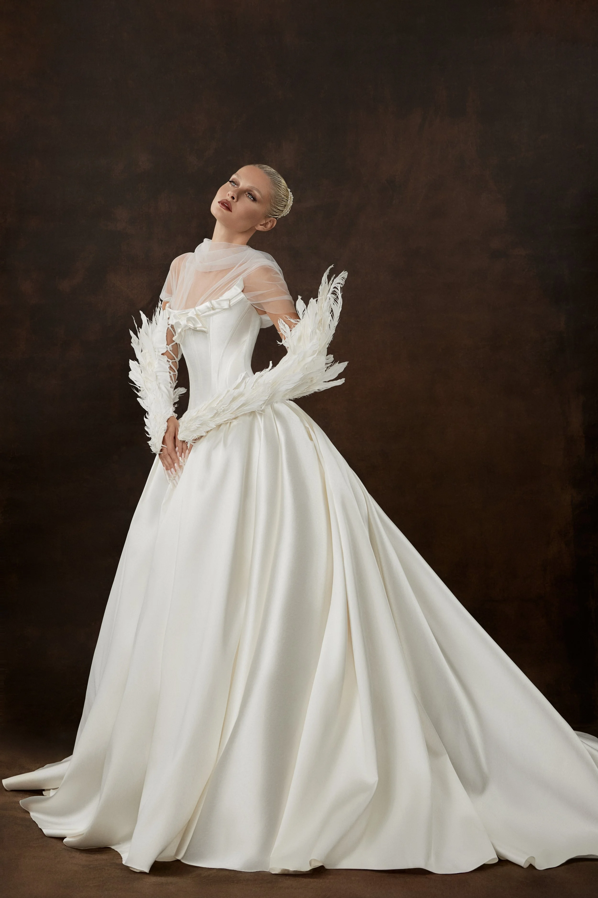 Ioanna wedding dress by Rara Avis — full front view of heavy satin ball gown with scoop neckline, ribbon trim detail, and dramatic long train