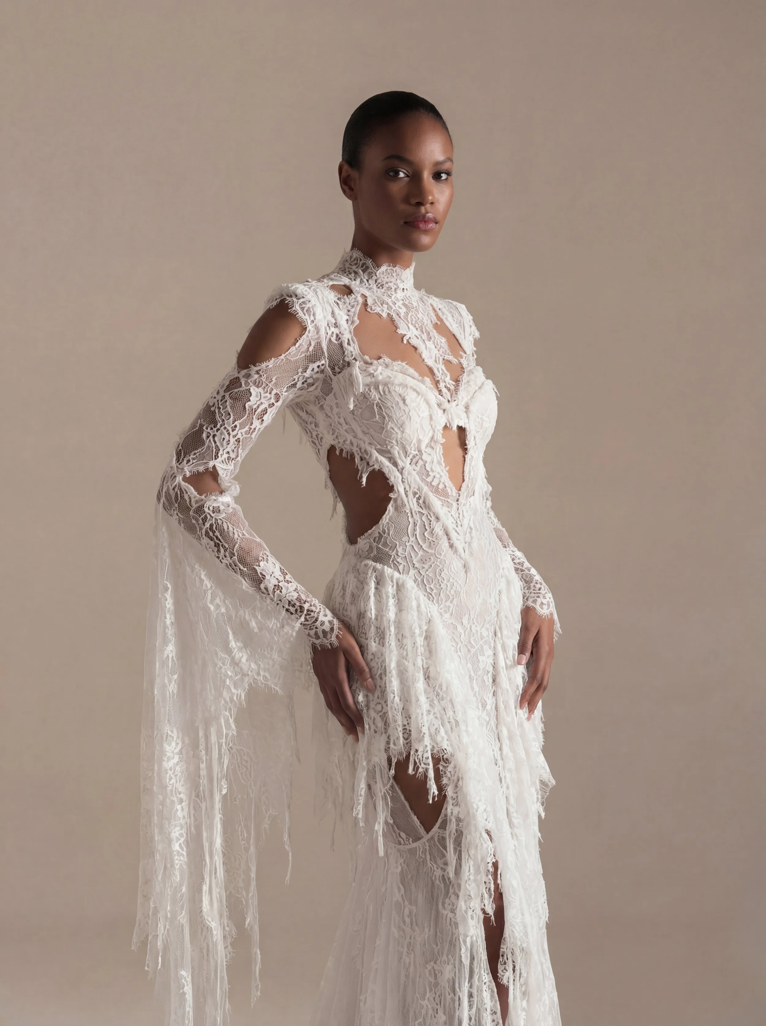 Feminine mermaid wedding gown with lace details, bell sleeves, and open back – Ellie