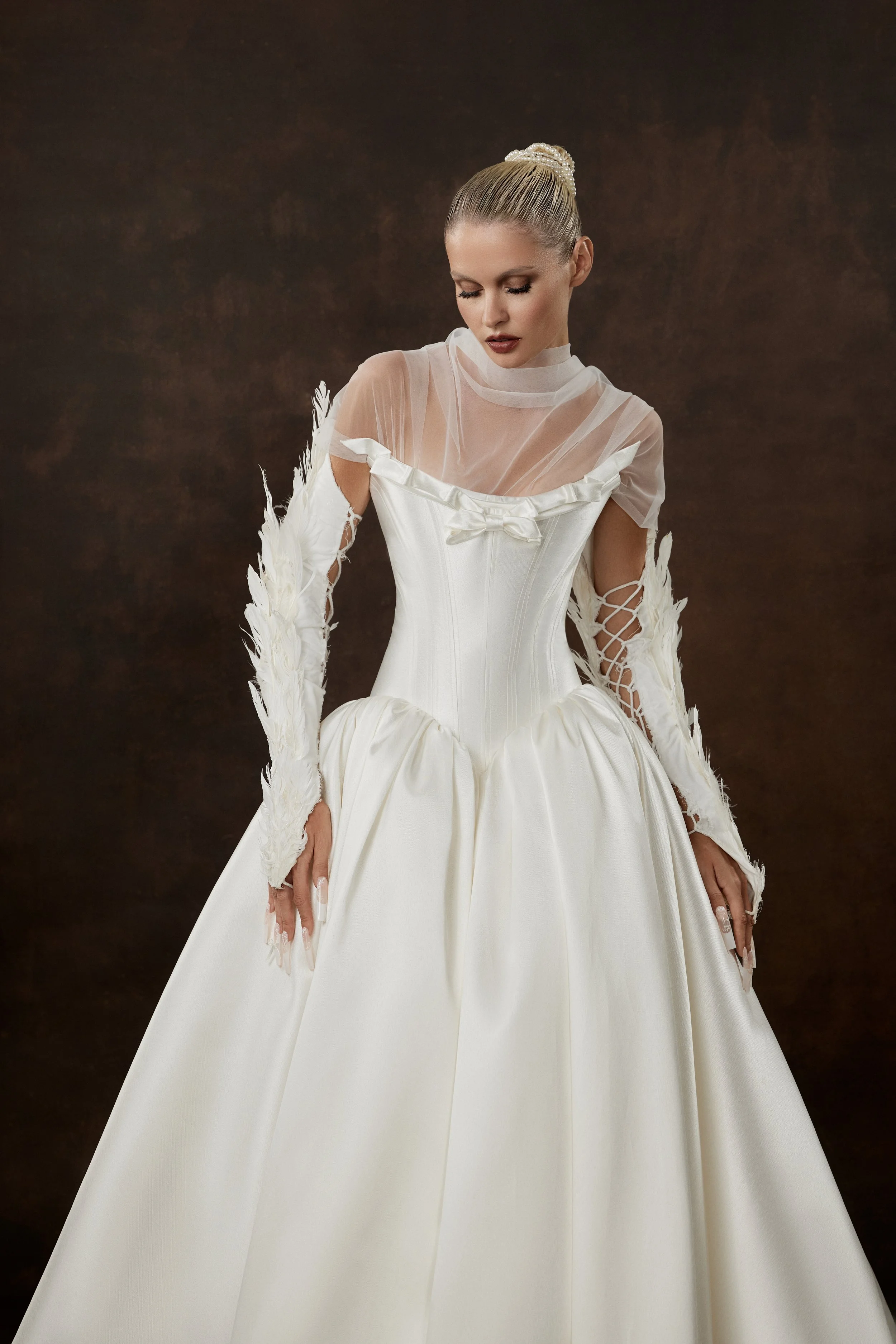 Ioanna wedding dress by Rara Avis — full front view of heavy satin ball gown with scoop neckline, ribbon trim detail, and dramatic long train