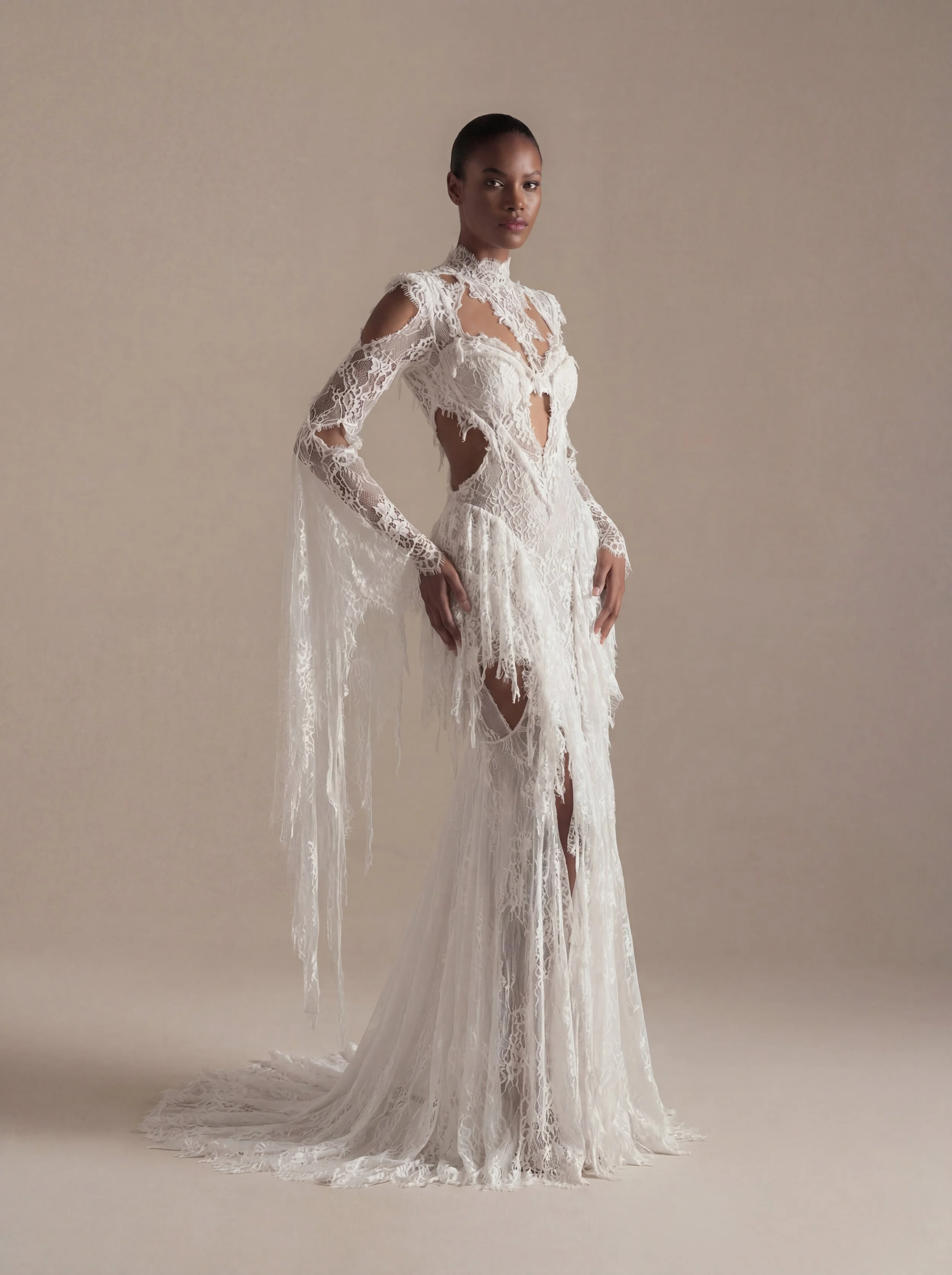 Feminine mermaid wedding gown with lace details, bell sleeves, and open back – Ellie