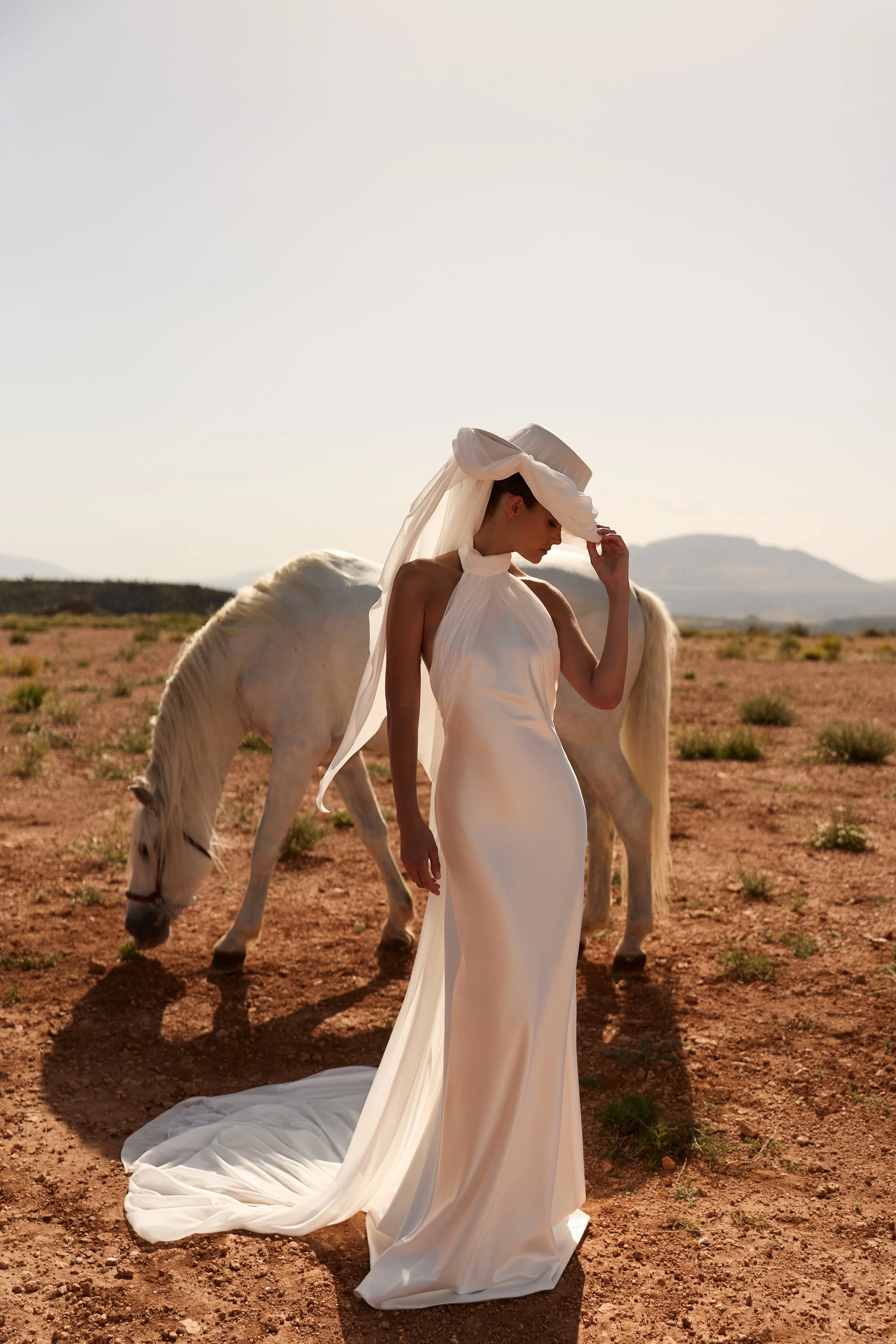 satin wedding dress, halter neck wedding dress, minimalist wedding dress, high neck wedding dress, wedding dress with chiffon train, modern satin wedding gown NYC