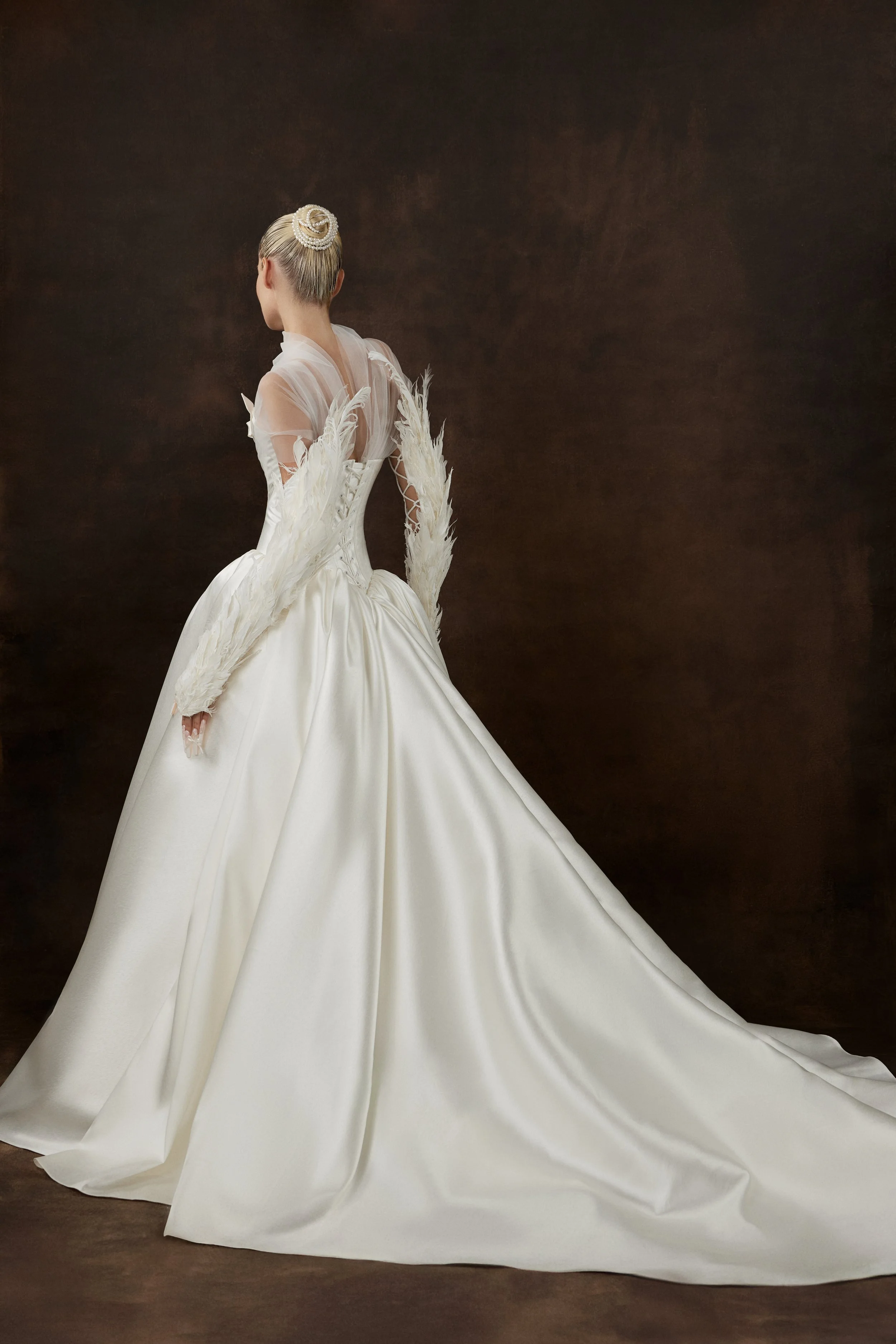 Ioanna wedding dress by Rara Avis — full front view of heavy satin ball gown with scoop neckline, ribbon trim detail, and dramatic long train