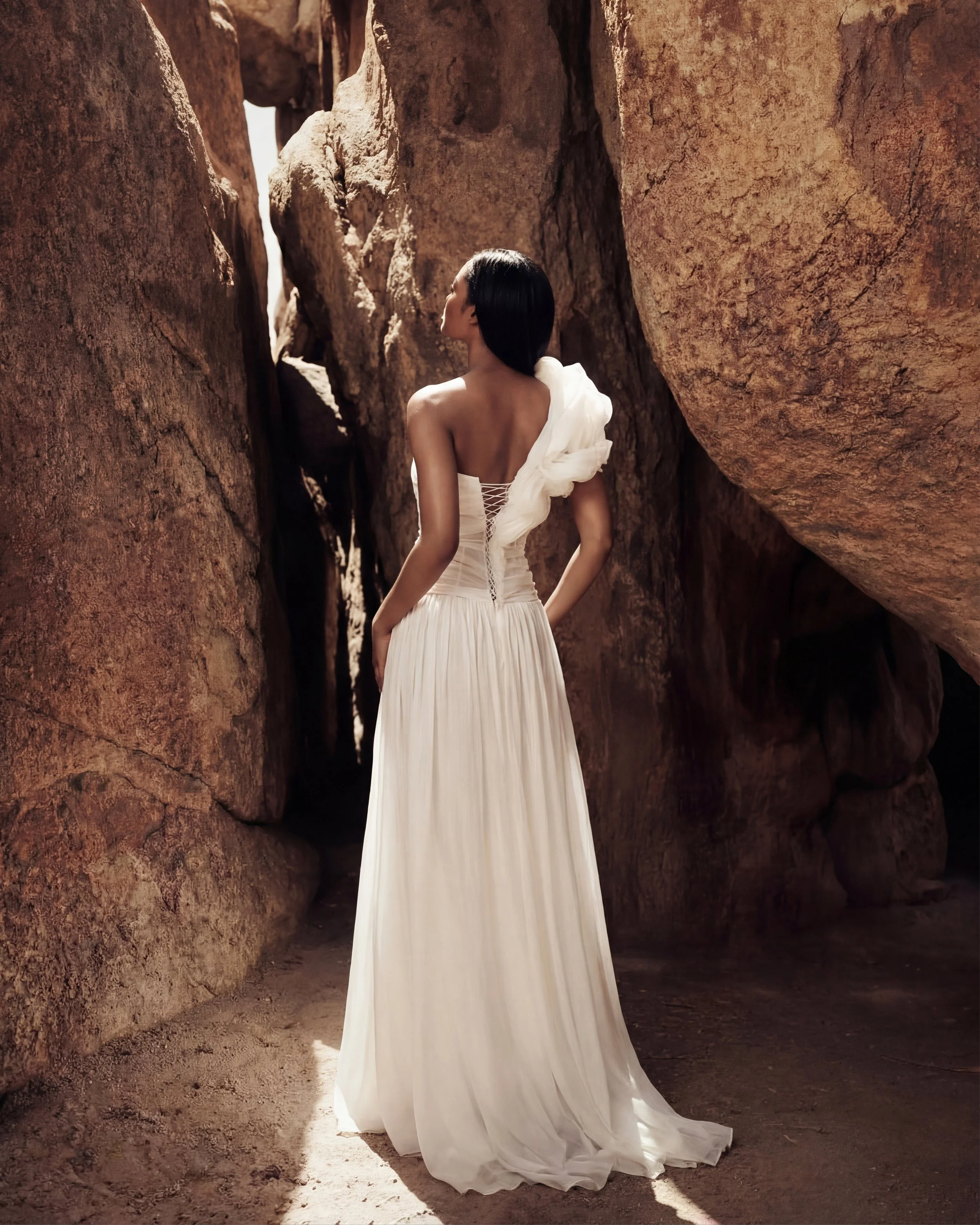 Wedding dress by Lana Marinenko with a dropped waist silhouette in luxurious silk, modern and elegant design
