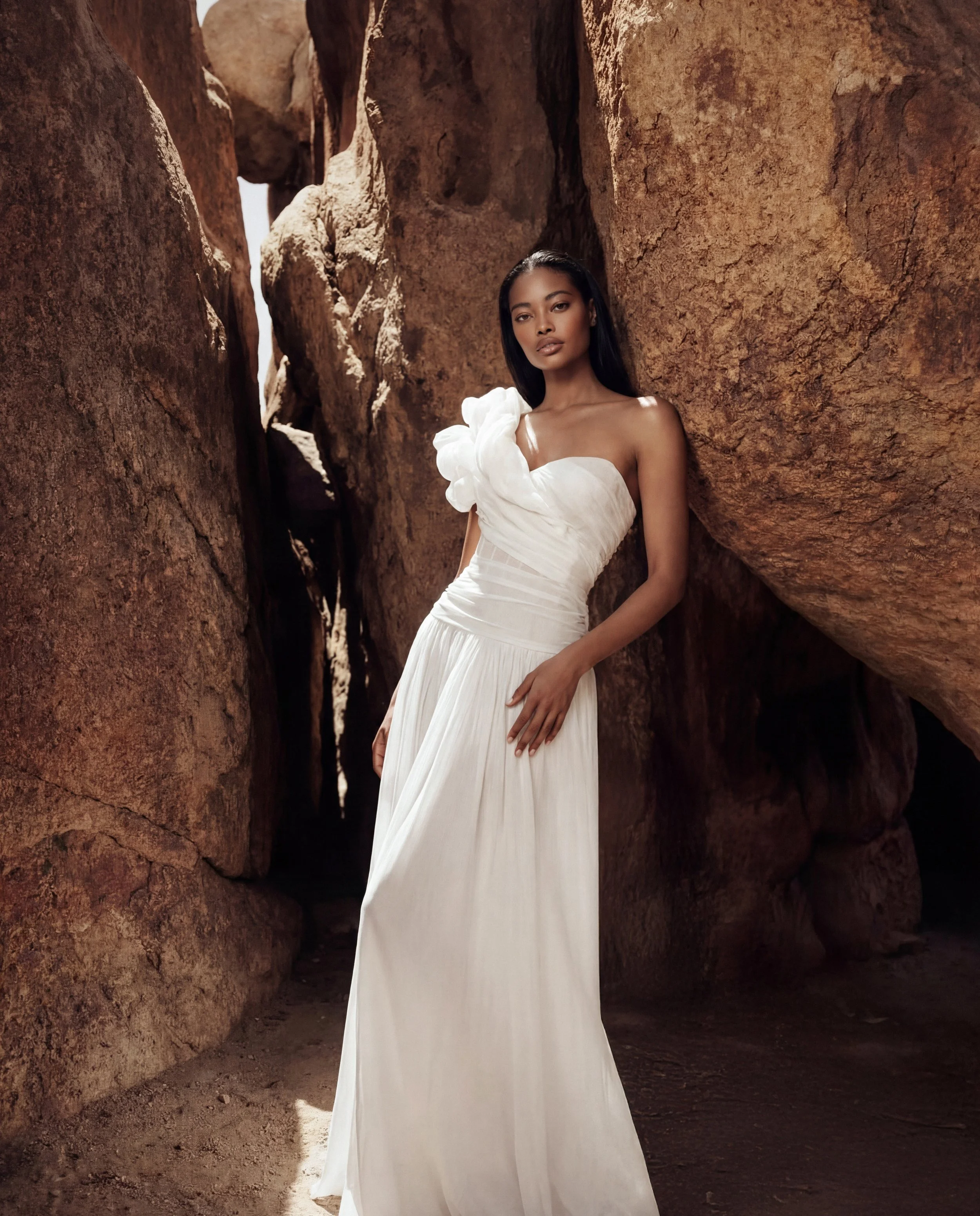 Wedding dress by Lana Marinenko with a dropped waist silhouette in luxurious silk, modern and elegant design