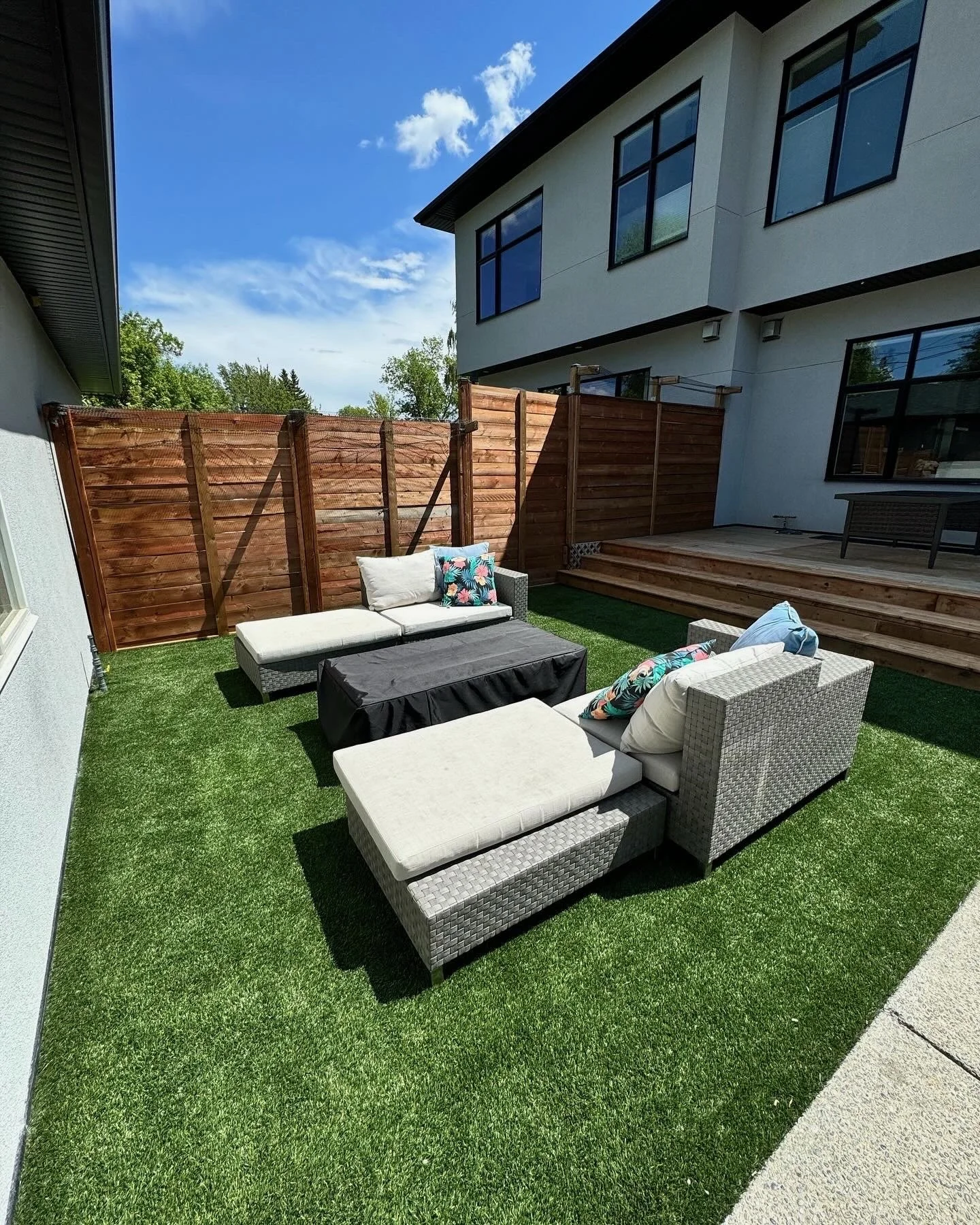 Artificial turf and gas fire pit installation.