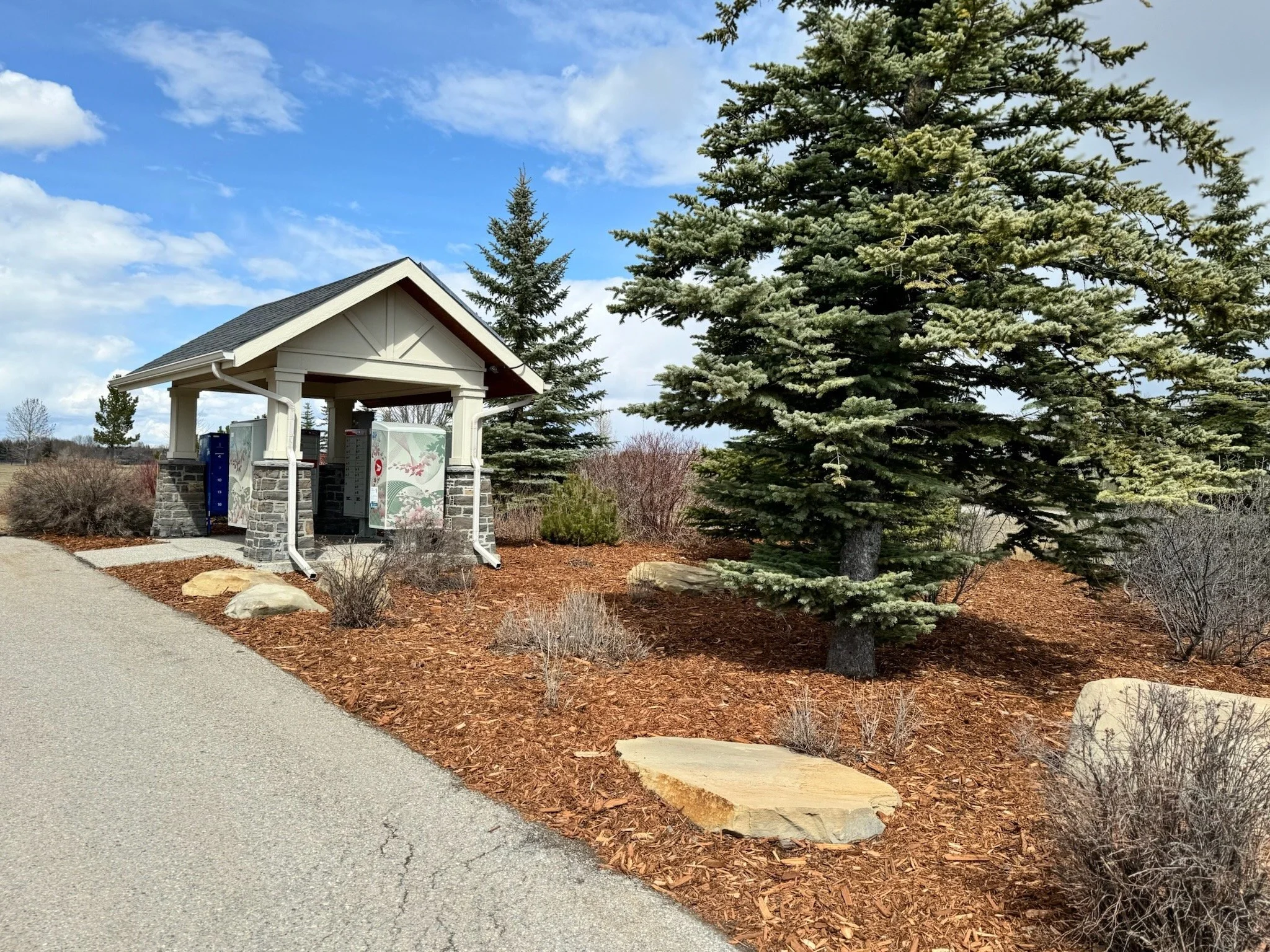 Mulch top up and spring clean up in community spaces.