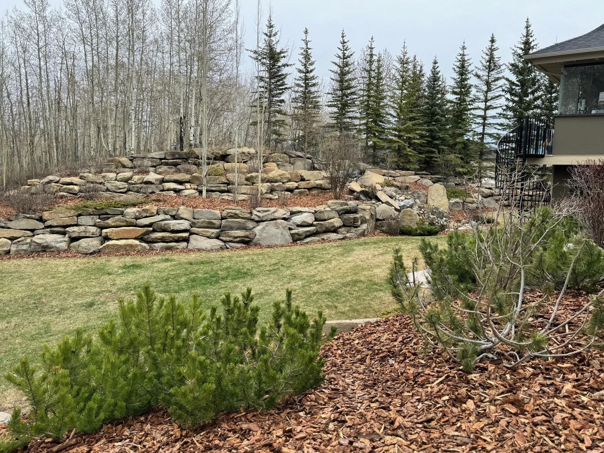 Mulch top up and spring clean up on an acreage property.