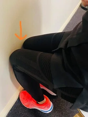 knees on wall, resized.jpg